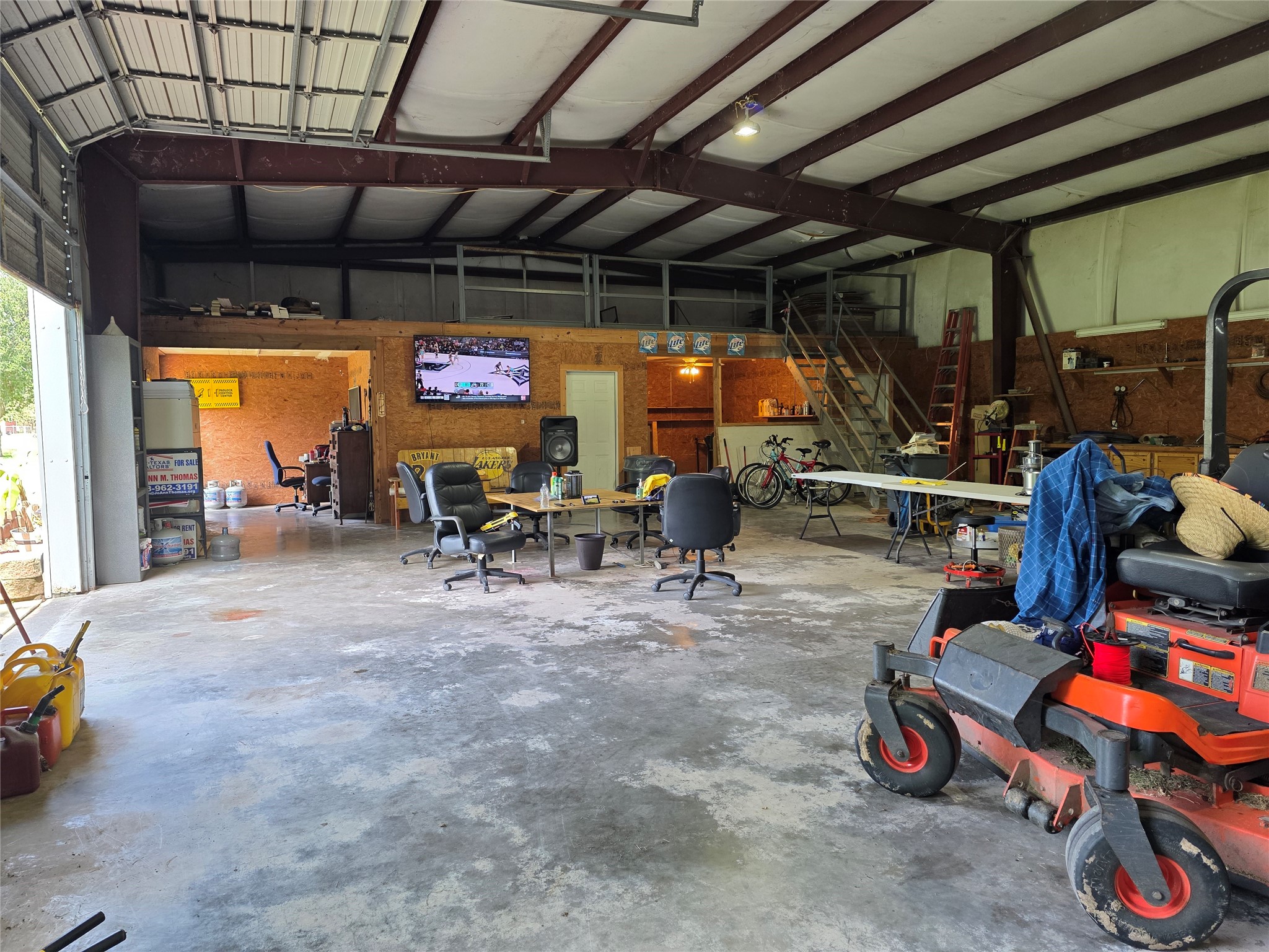 Man cave workshop.  He'll stay in here all day.