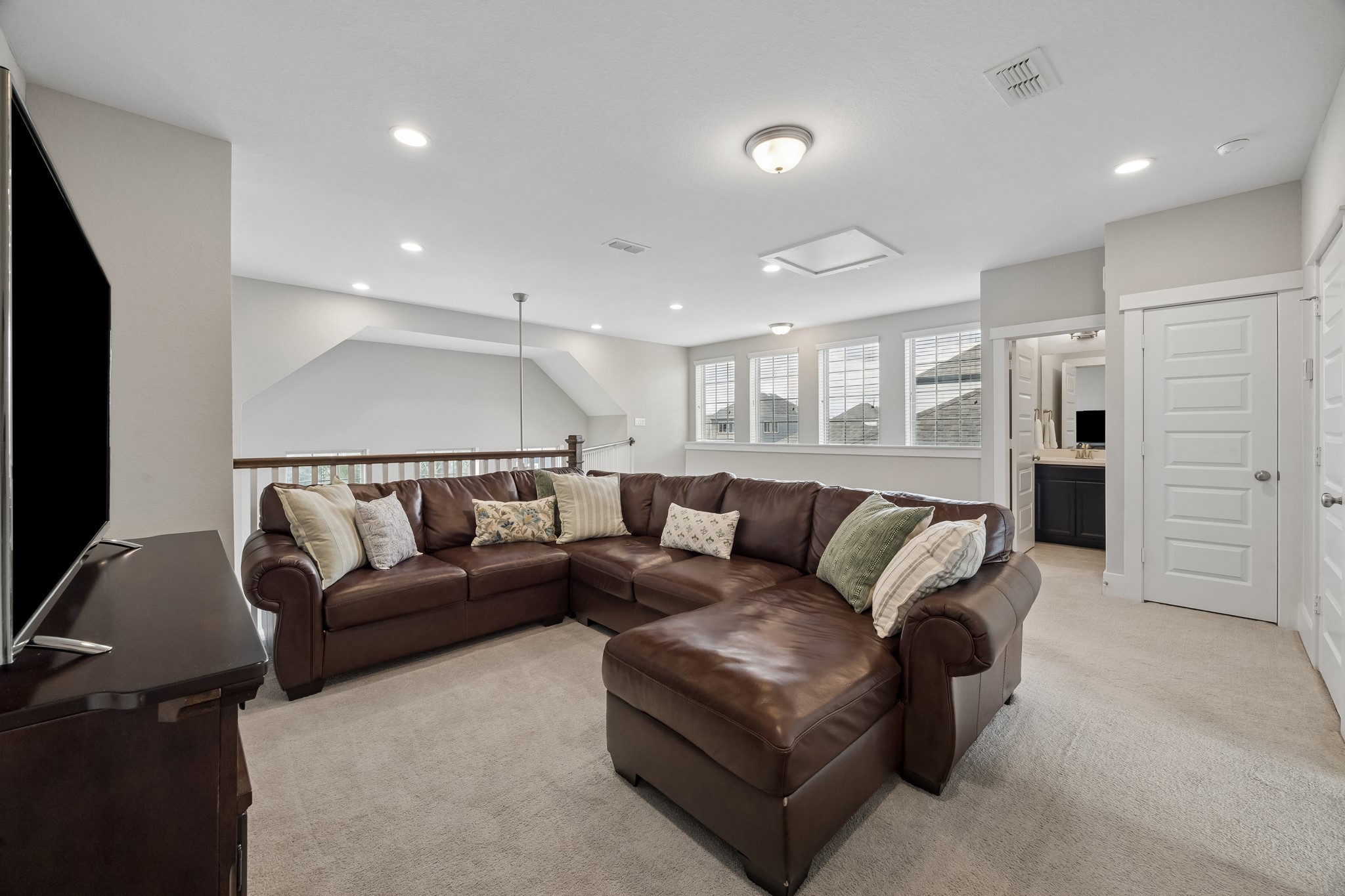 Located on the third floor, the fantastic game room provides the perfect space for entertainment, relaxation, or a play area.