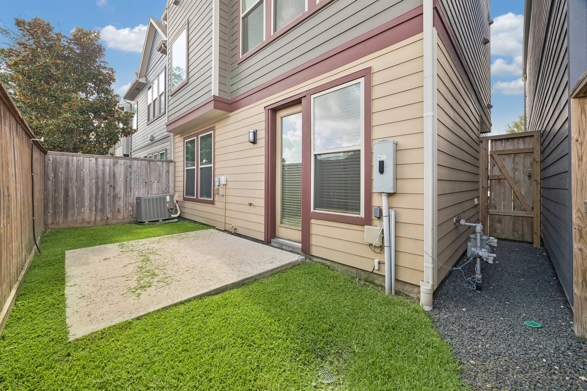 Located just outside the primary suite, the utility area offers added convenience and easy access for everyday living.