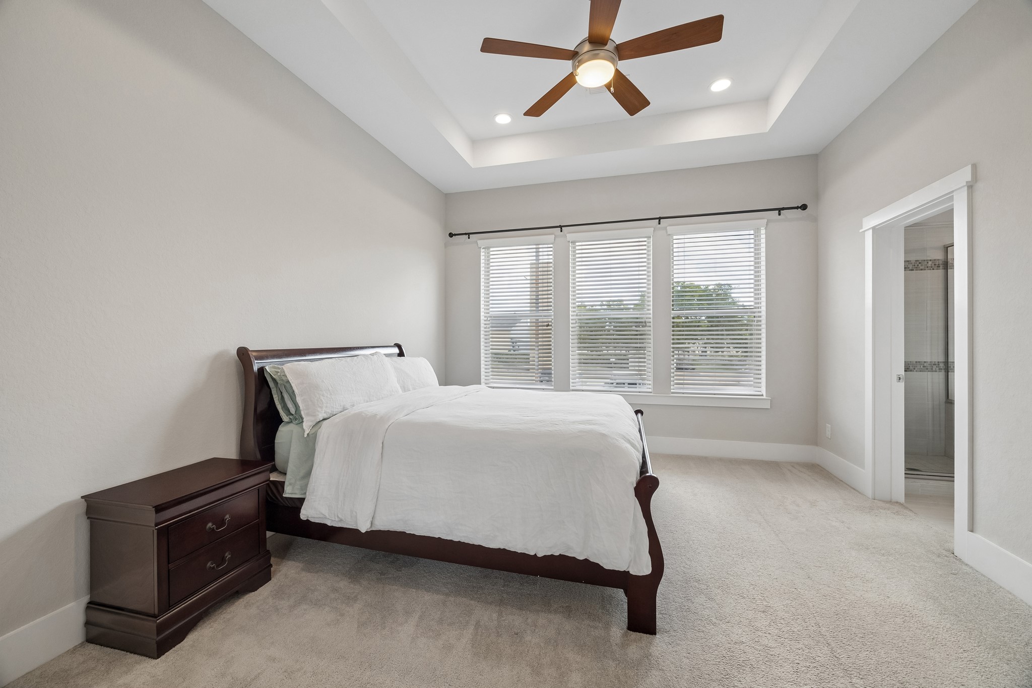 Privately situated on the second floor, the spacious primary bedroom includes an ensuite bathroom and a walk-in closet for added comfort and convenience.