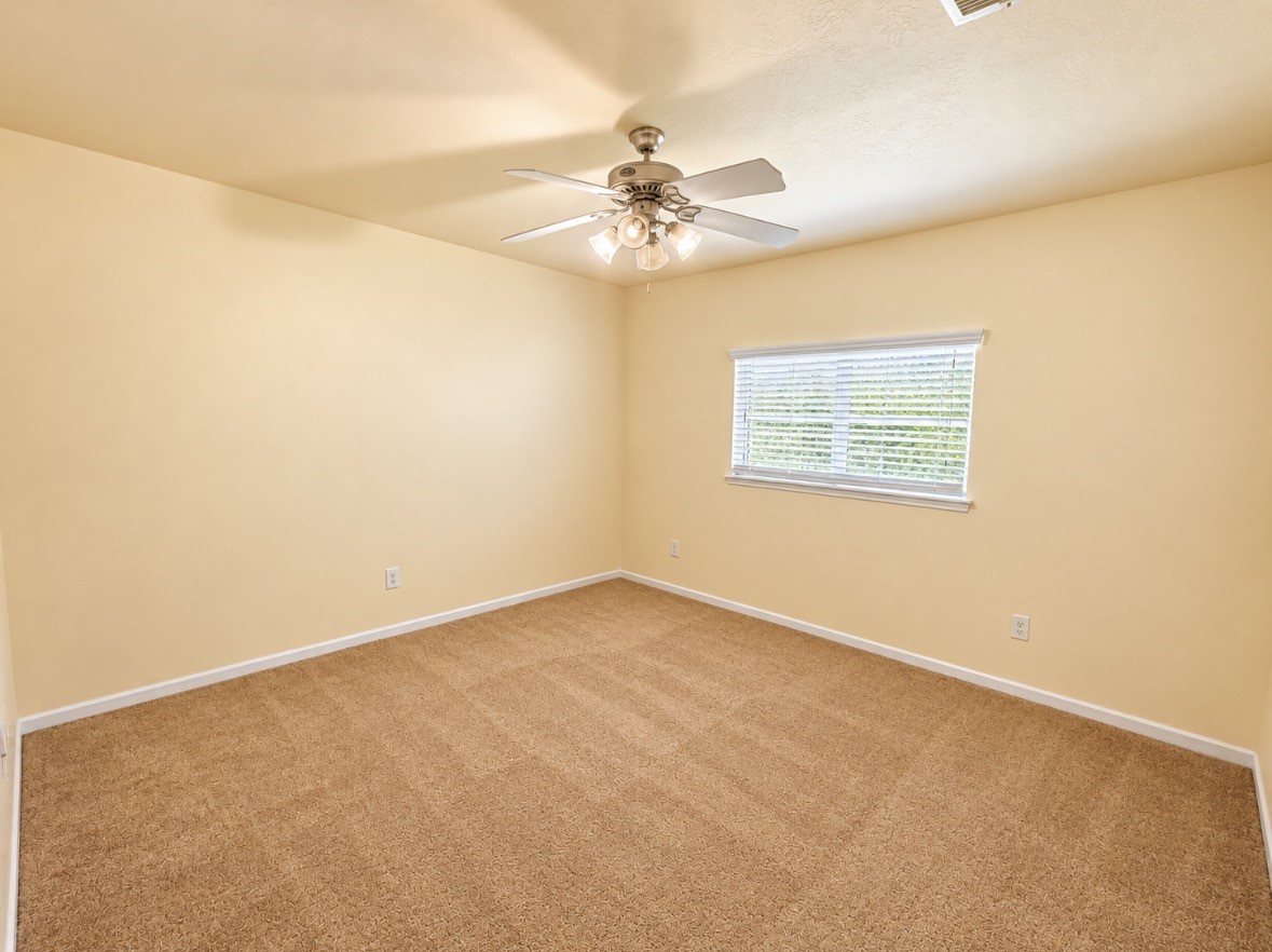 Generously sized secondary bedroom ready to become a comfortable retreat.
