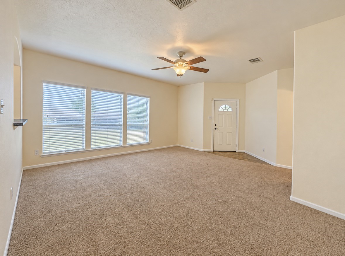 Spacious living area with plenty of room for comfortable seating, movie nights & making yourself at home. Spacious living area with plenty of room for comfortable seating, movie nights & making yourself at home.