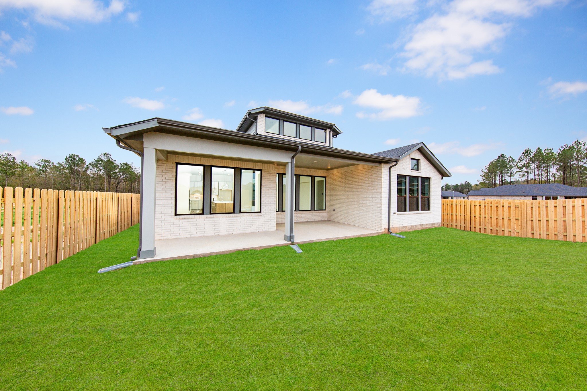 Come explore this generous backyardperfect for kids to play freely and adults to unwind in comfort!