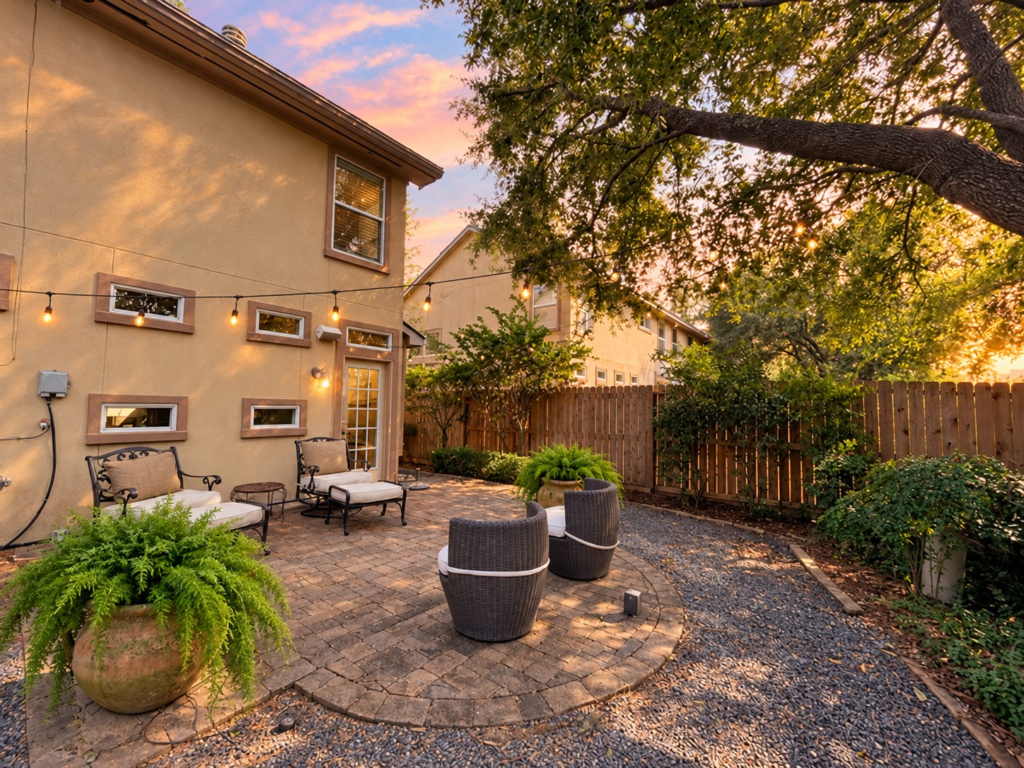 Back yard with enhances sunset sky
