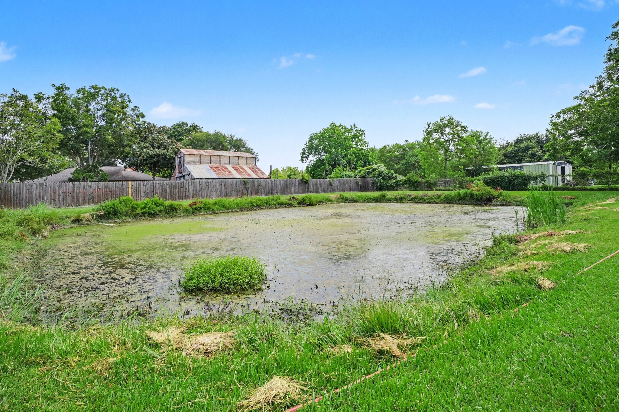 Pond is the very back of home.