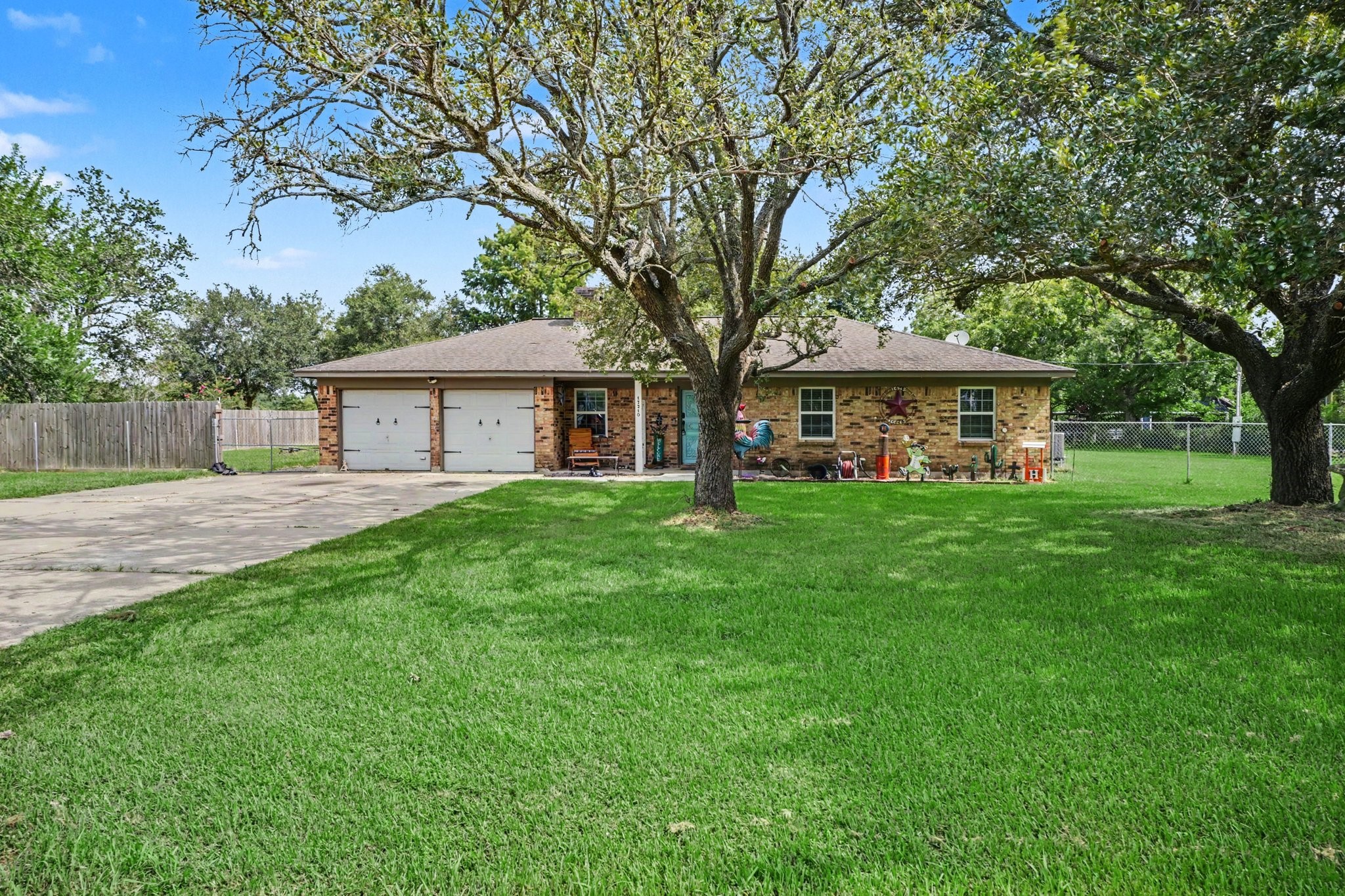 Mature trees and plenty of front yard