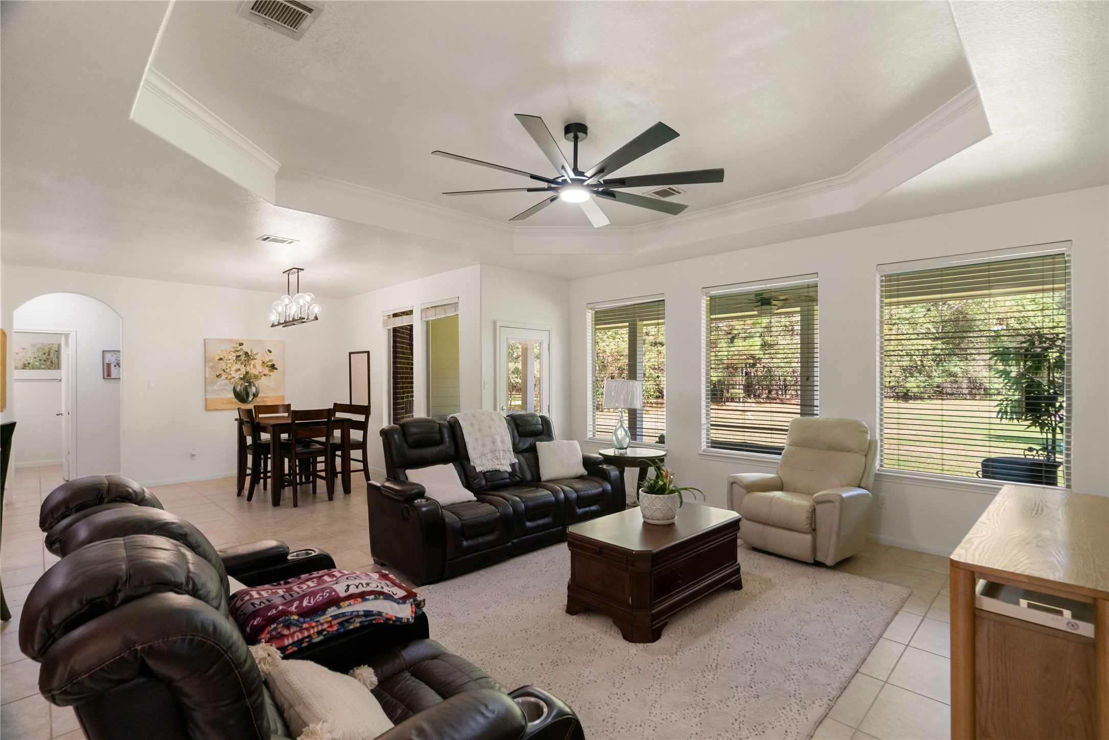 Light, airy, and wonderfully inviting! High ceilings and an open layout create a gathering space that feels like home.