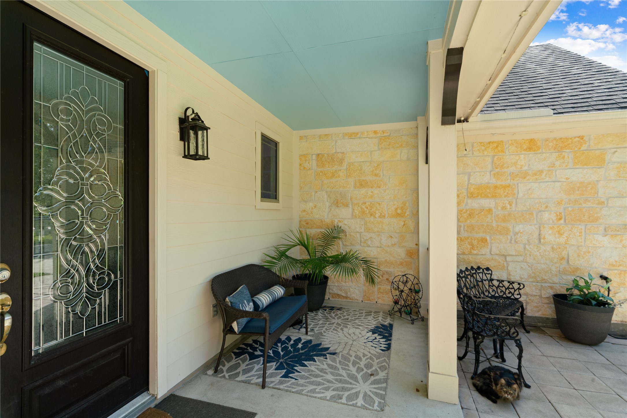 Slow mornings, sweet tea, and evenings spent unwinding. This charming covered porch invites you to sit back and stay awhile.