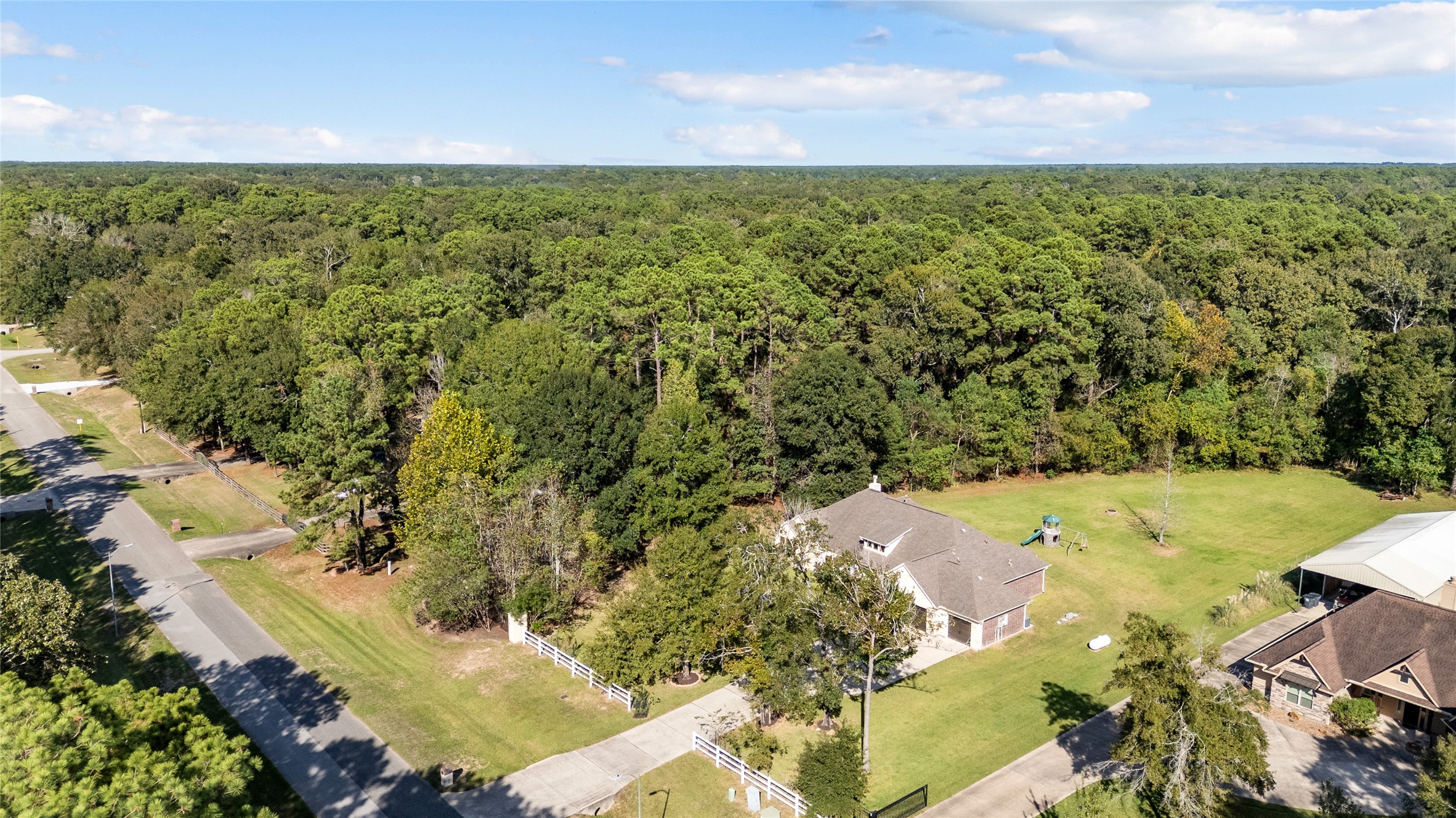 Where winding roads meet towering trees and peaceful surroundings. Experience the beauty of living beyond the ordinary subdivision.
