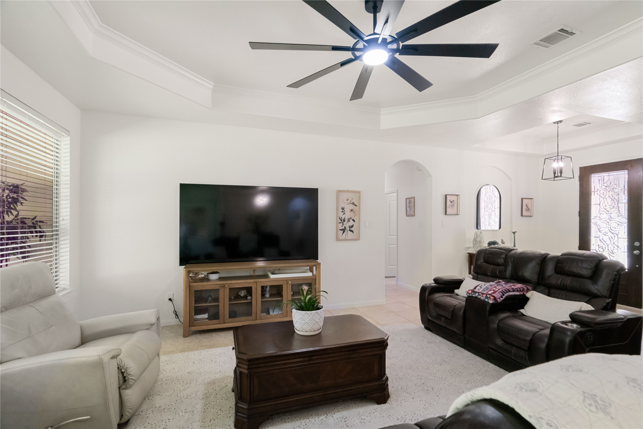 Movie nights, lazy Sundays, and memories in the making! This spacious living room is ready for all of life's favorite moments.