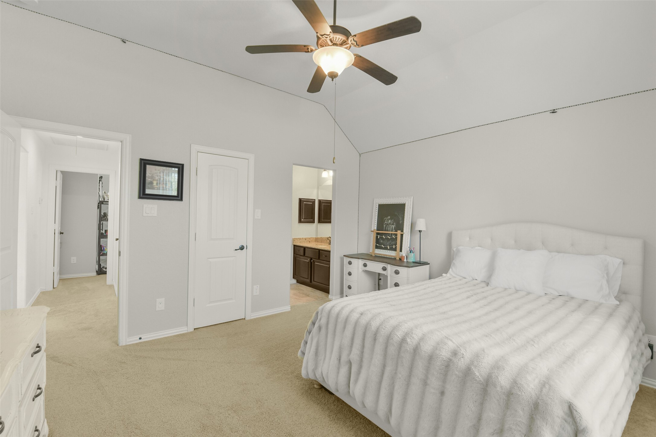 Alternate bedroom view highlighting the spacious floor plan and convenient access to nearby rooms.