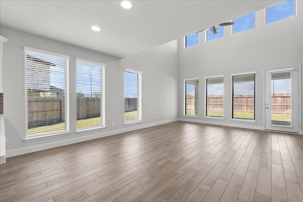 The kitchen opens to a 2 story dining and living area.