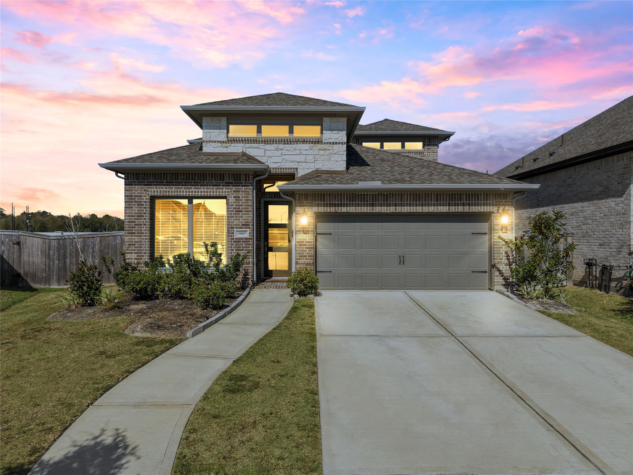 Welcome to 19007 Satsuma Ridge Dr. Located on a quiet street, this rental home is ready for moving in just in time for the holidays! (virtually staged dusk photo)!