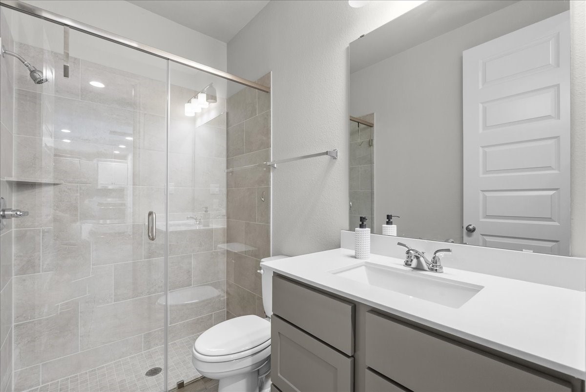 Full size guest bathroom.