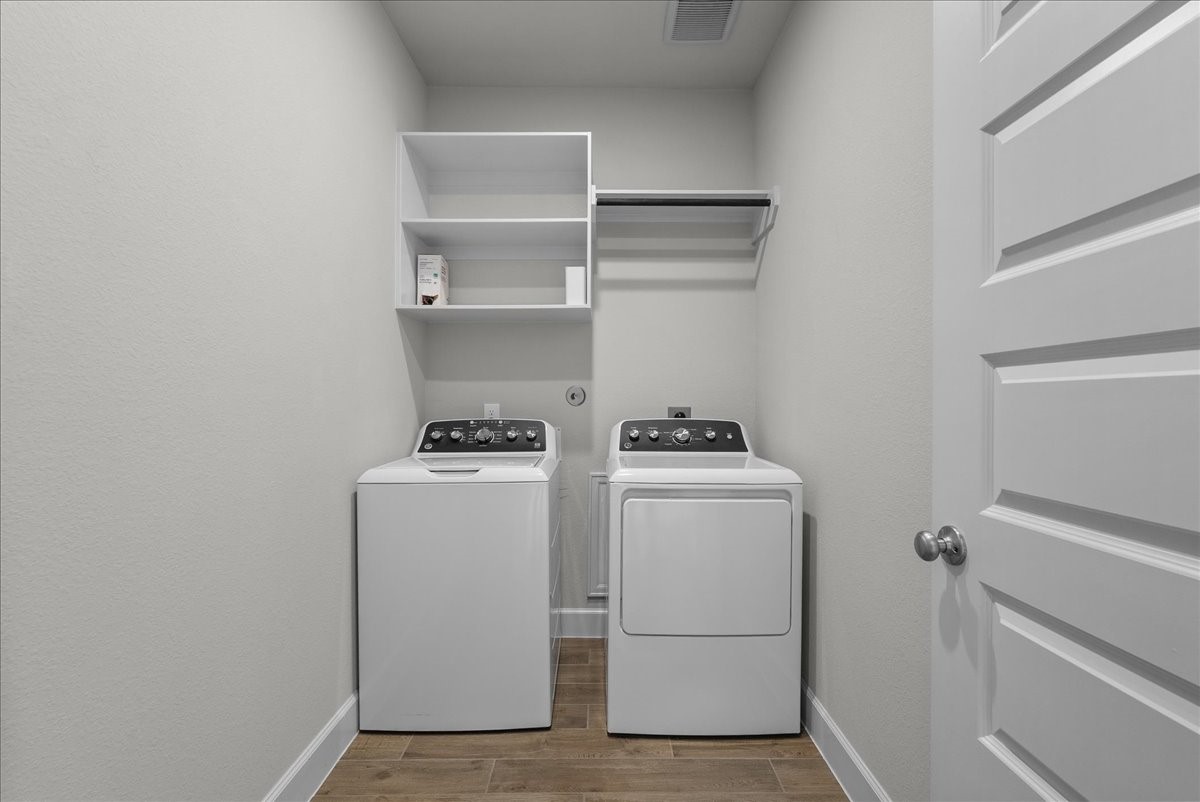 Utility room is on the first floor next to the study. Washer and dryer included with the home.