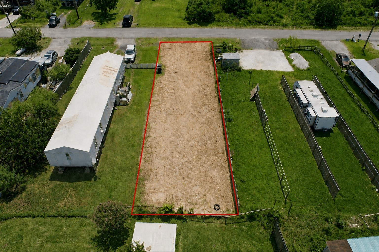 Aerial View from rear.  Centerpoint added two utility poles, one with new light, Aug 2026 on either side of front of the lot.