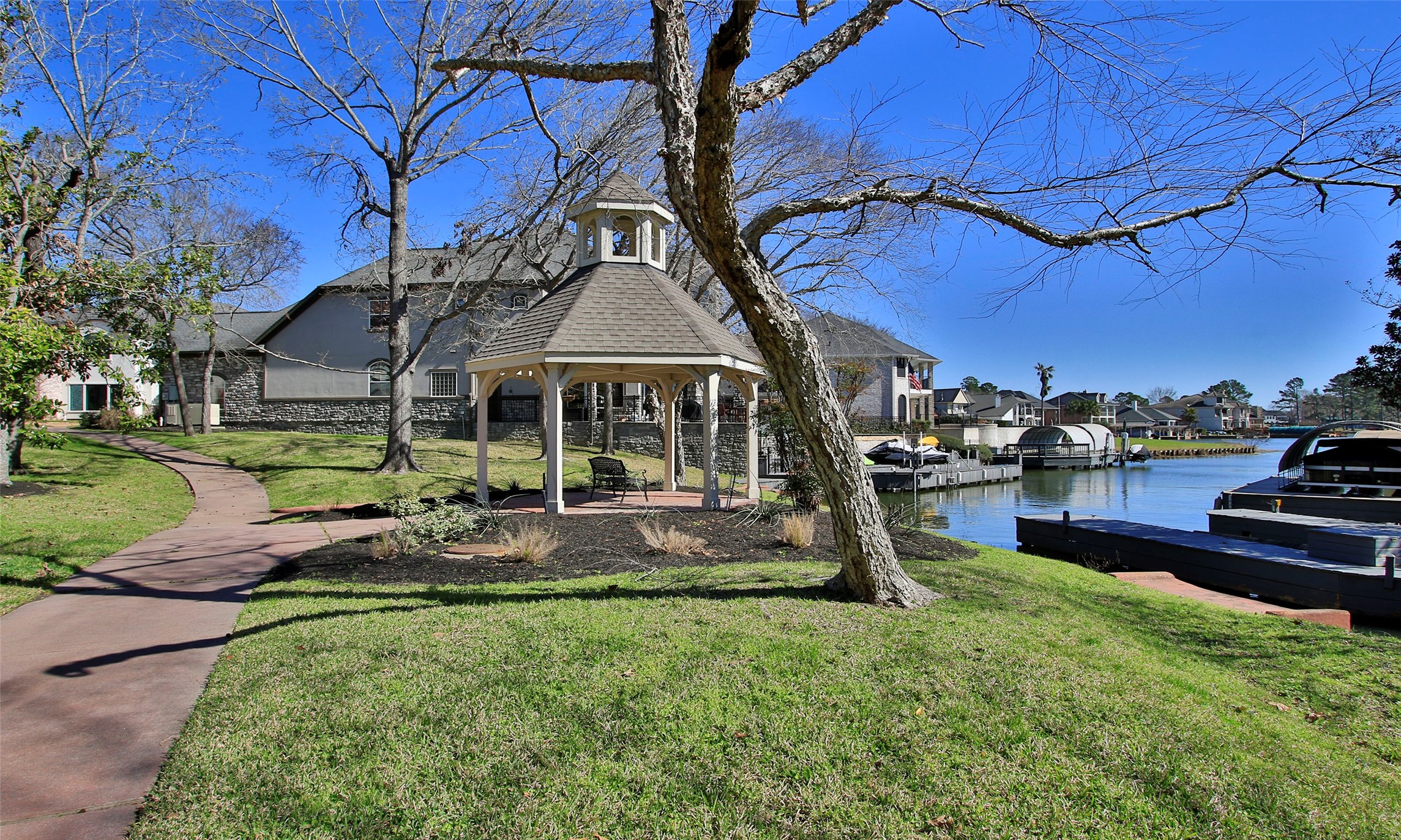 Unobstructed water views with a walking path behind the property. This waterfront park sits directly behind 26 Winthrop Harbor and will never be developed, which protects your water view for years to come.