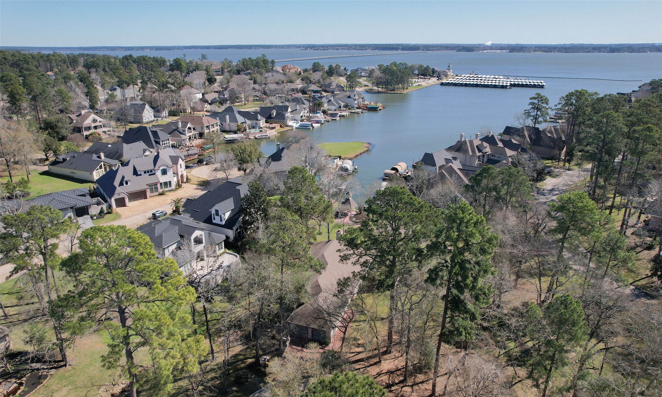 Aerial view shows proximity from the lot to the lake. Aerial view shows proximity from the lot to the lake.