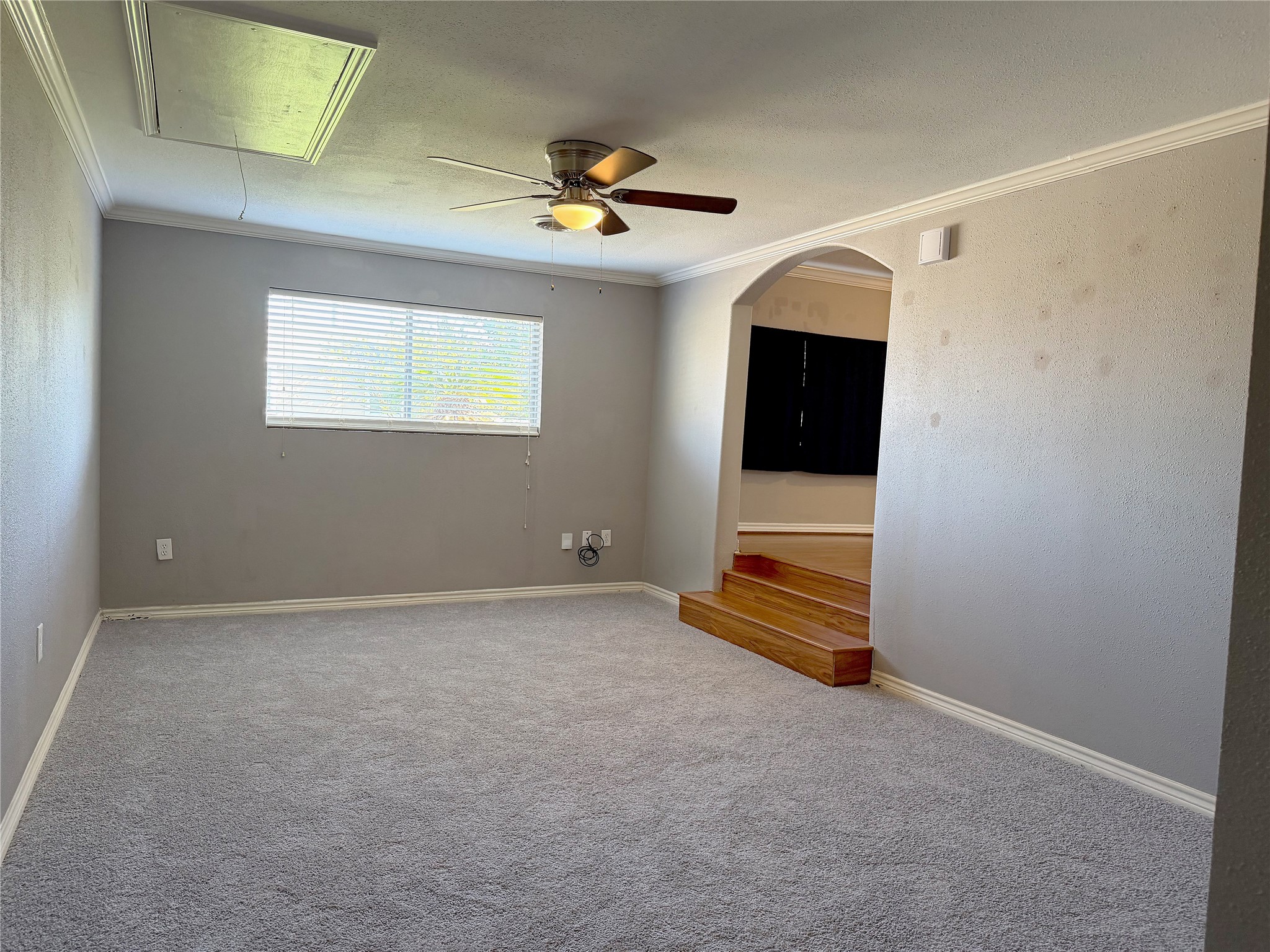 Step-down den features carpeting and offers a separate, comfortable living area within the home. Step-down den features carpeting and offers a separate, comfortable living area within the home.