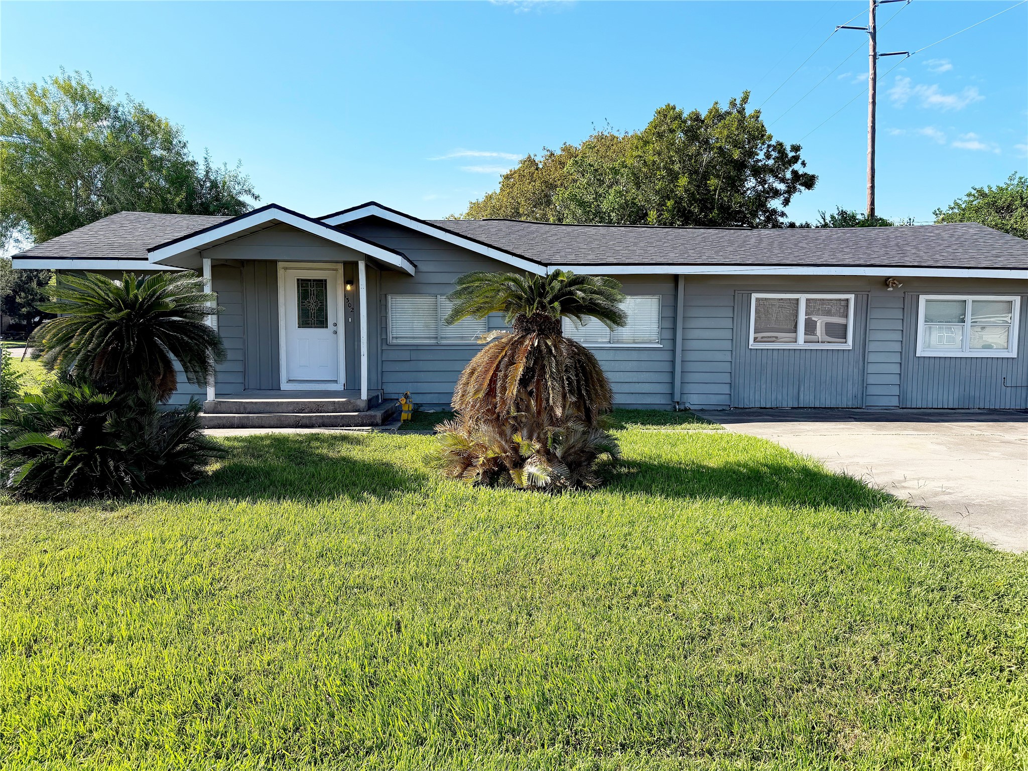 Exterior front view features a small covered porch that creates a defined entry and provides a sheltered space at the front door. Exterior front view features a small covered porch that creates a defined entry and provides a sheltered space at the front door.