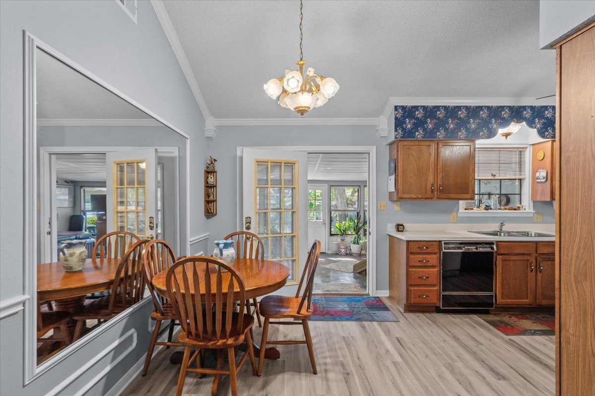 Dining room area with door to screened in patio.