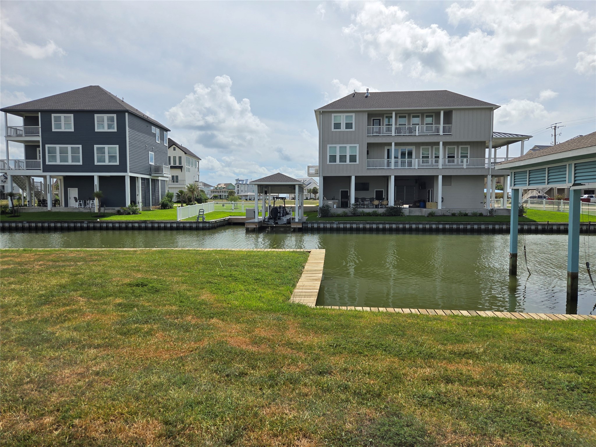 Beautiful homes across the canal with 50' between the build pads