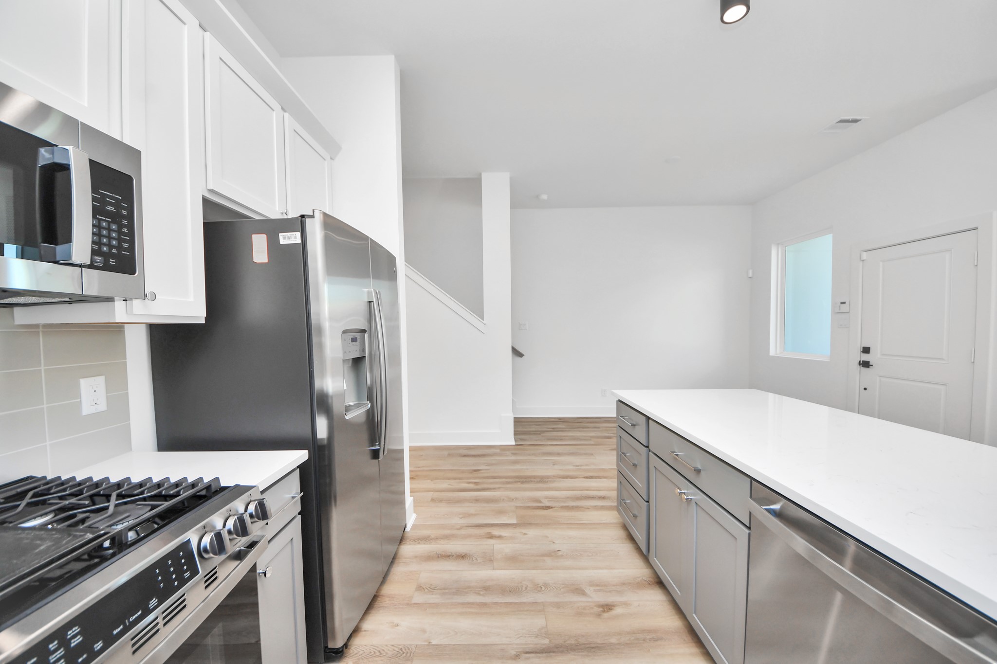 Unit A kitchen overlooking the dining area.