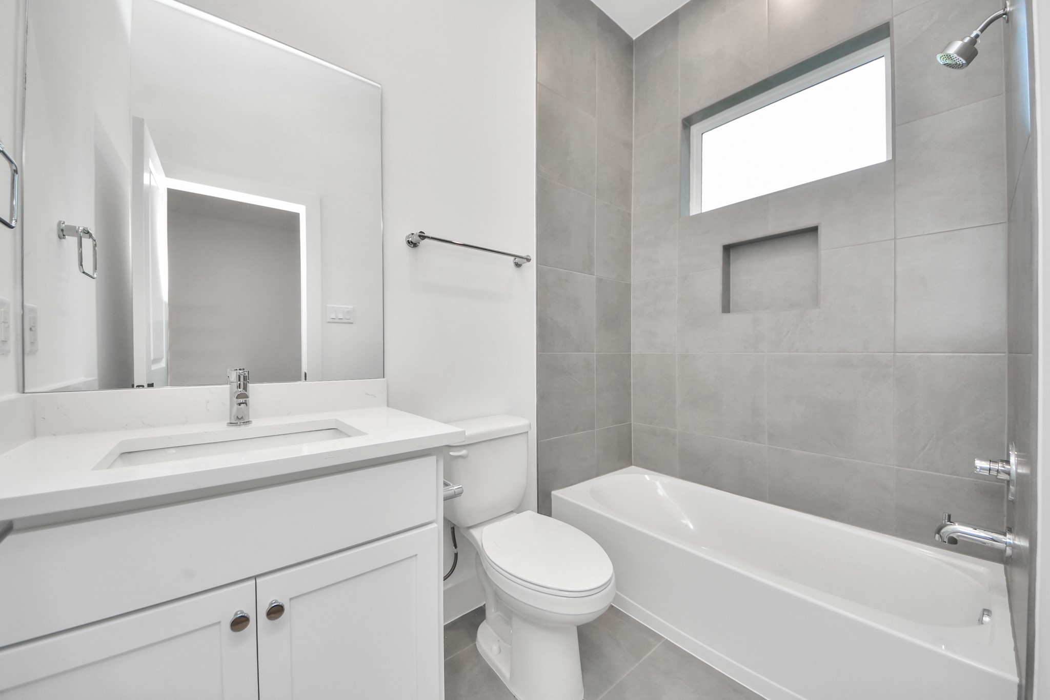 Primary ensuite bathroom of Unit B.