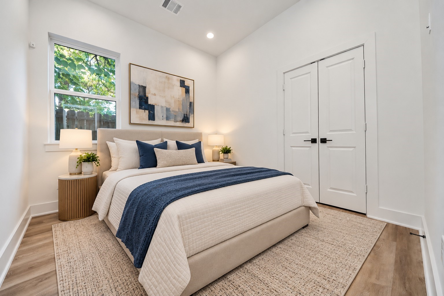 Virtually staged first bedroom on the first floor of Unit A.