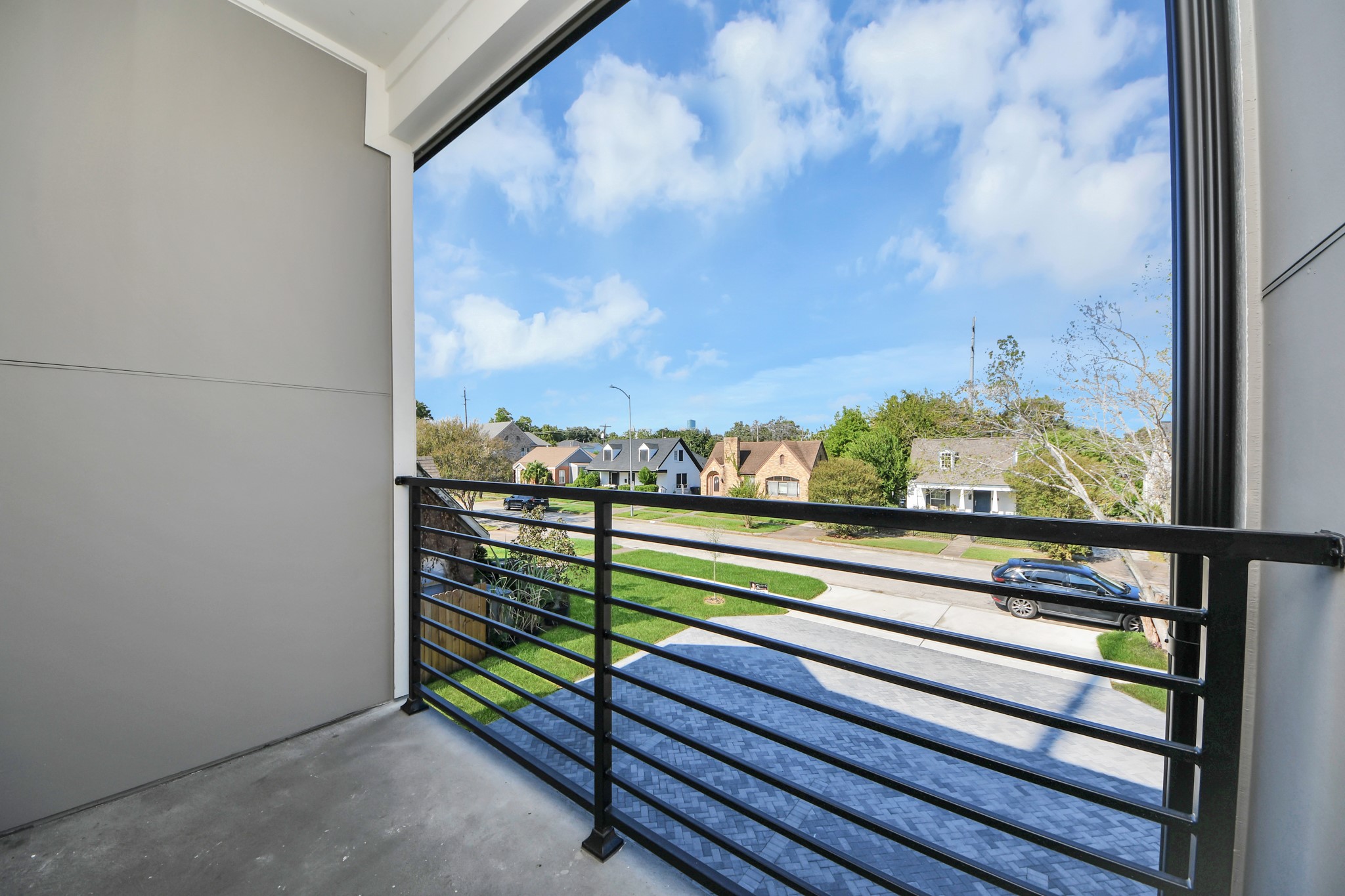Unit B private second-floor balcony.