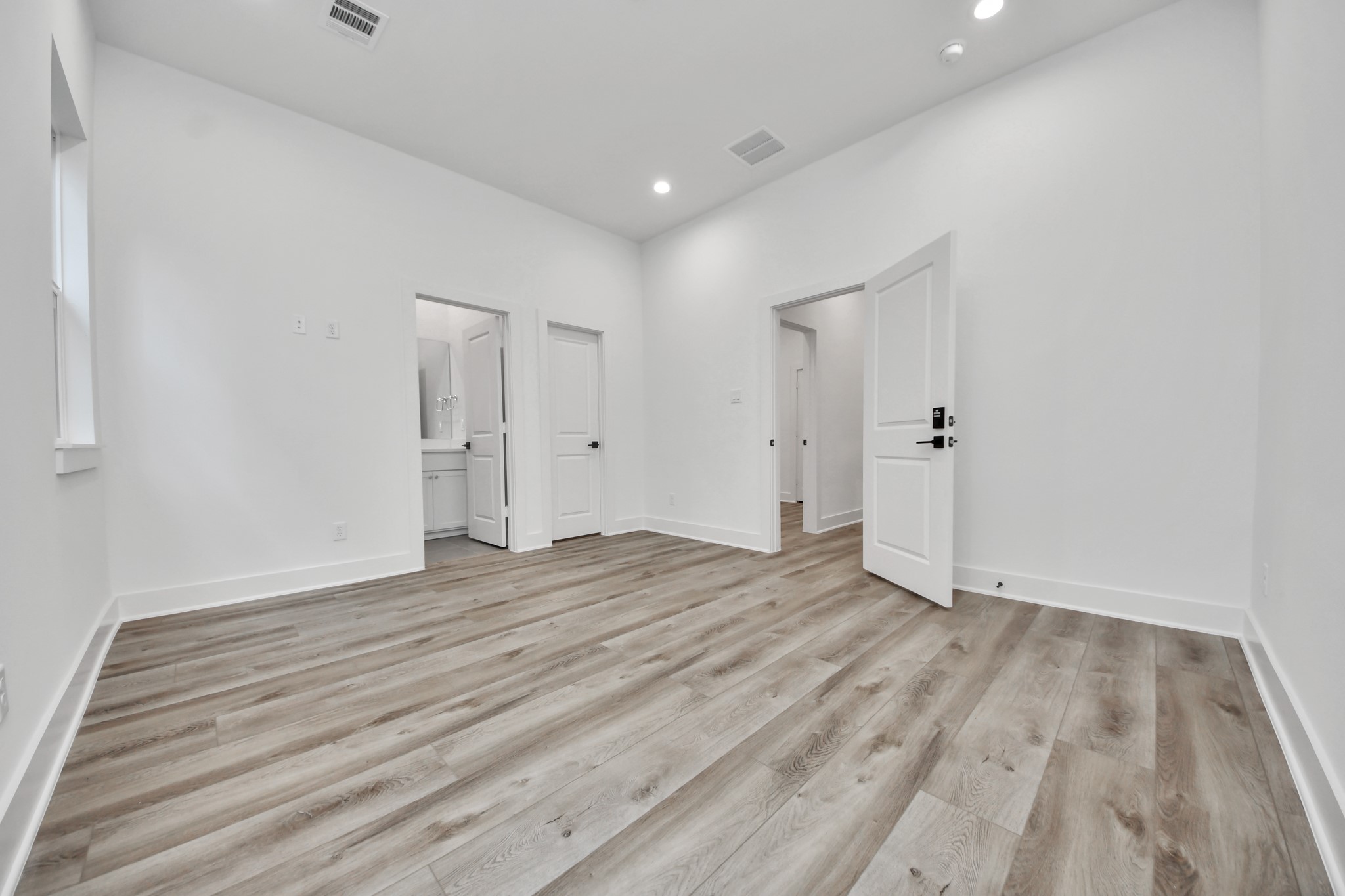 Another angle of Unit A primary bedroom.