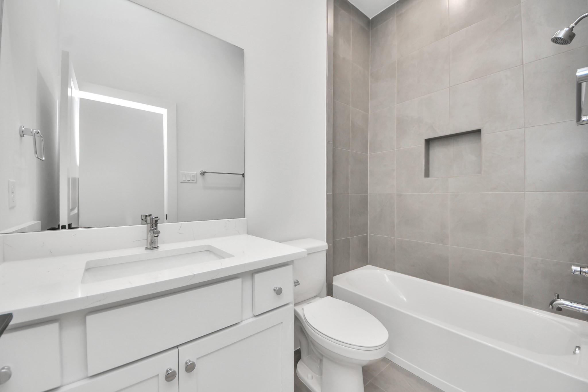 First floor full bathroom of Unit A.