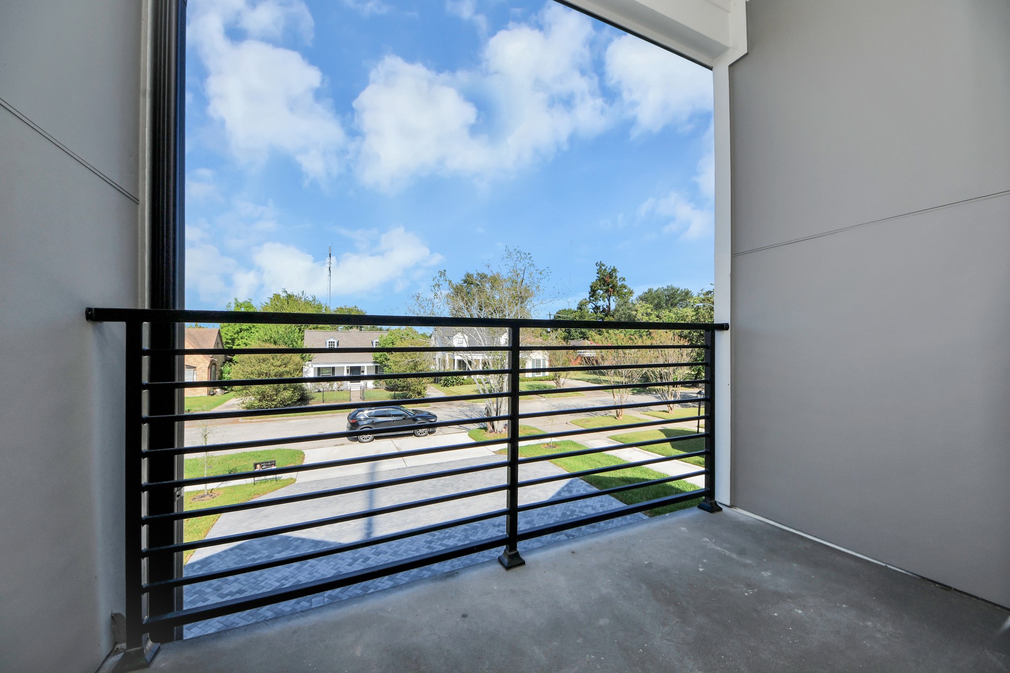 Unit A private second-floor balcony.