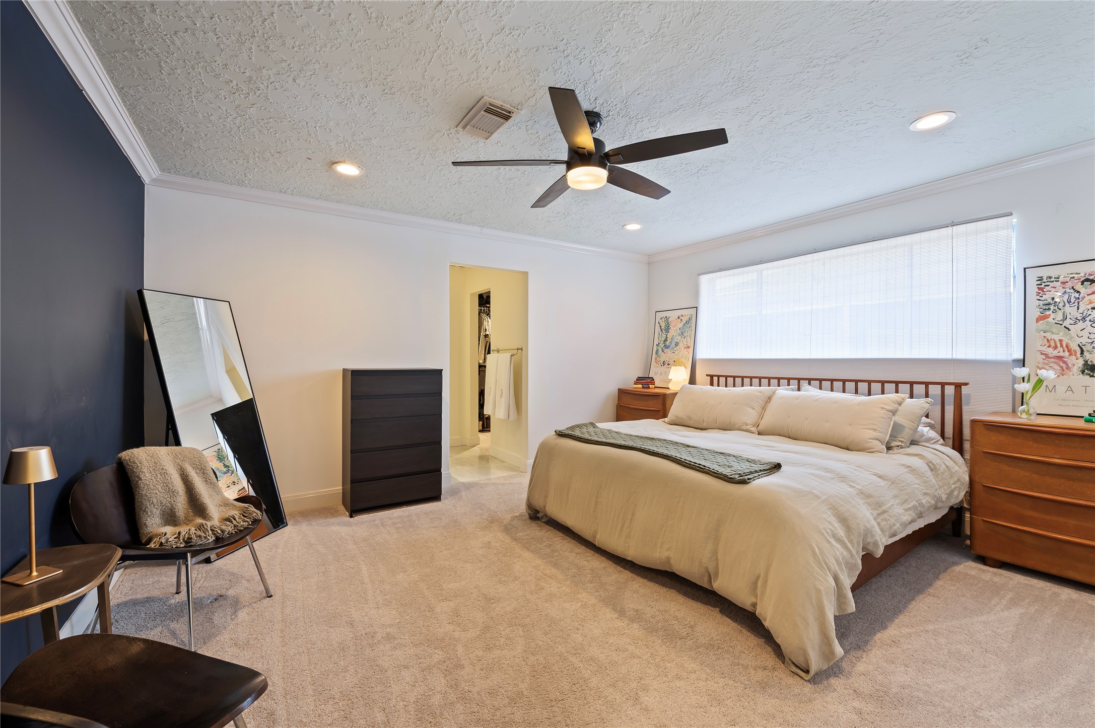 Large primary suite with direct and private access to the primary bath.