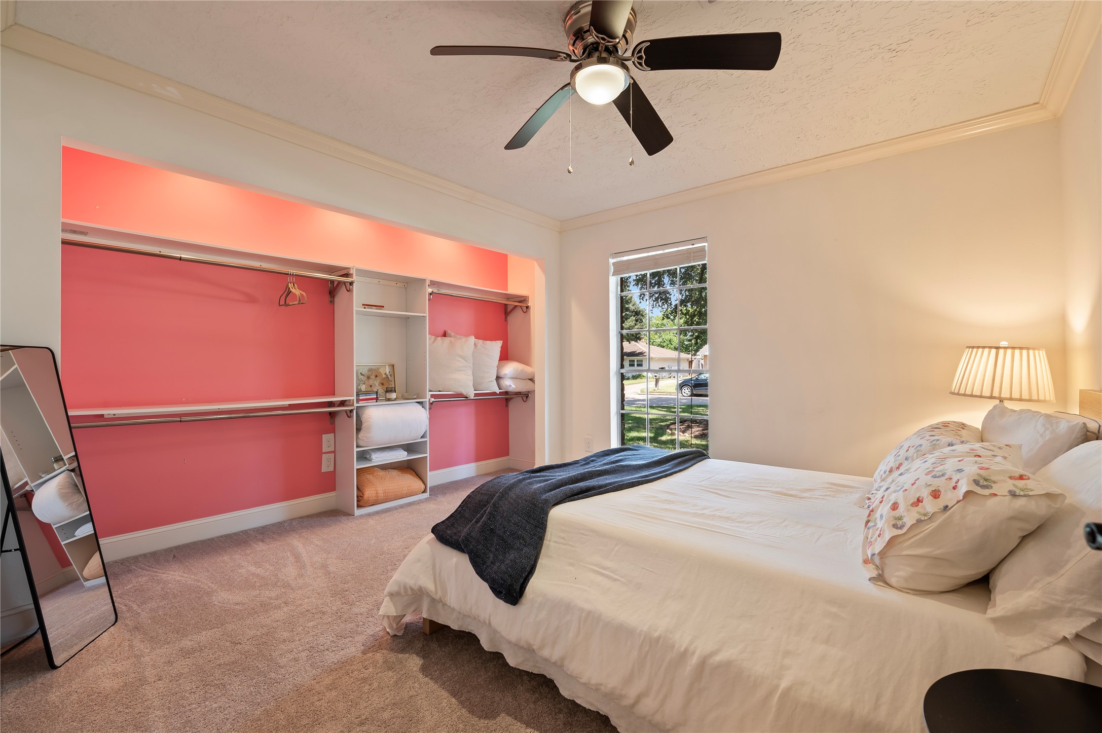 2nd bedroom is very spacious with wall to wall closet space.