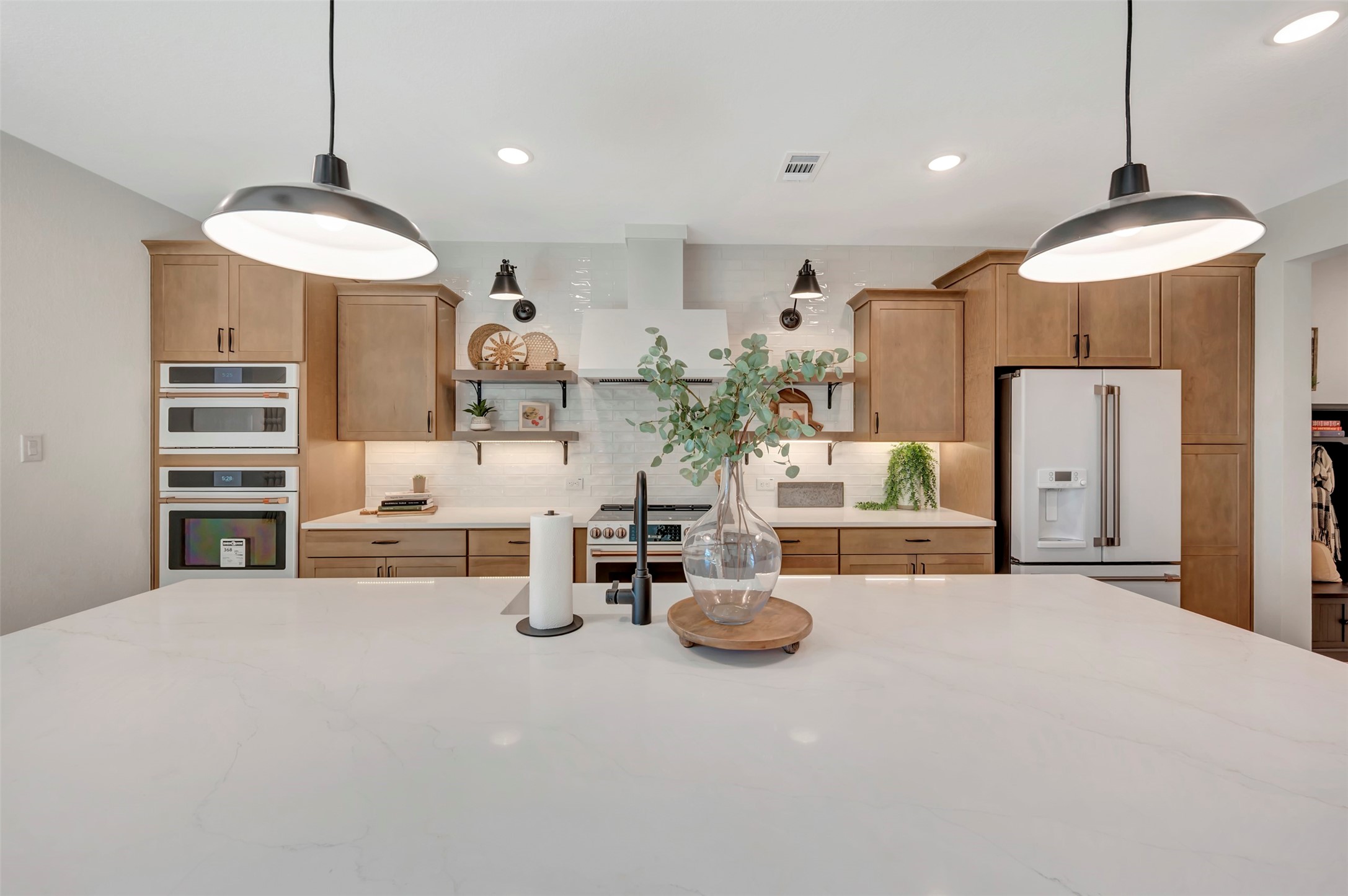 Gourmet island kitchen (*Photo not of actual home and used for illustration purposes only. Colors/finishes may differ from the ones currently selected in the home.) Gourmet island kitchen (*Photo not of actual home and used for illustration purposes only. Colors/finishes may differ from the ones currently selected in the home.)