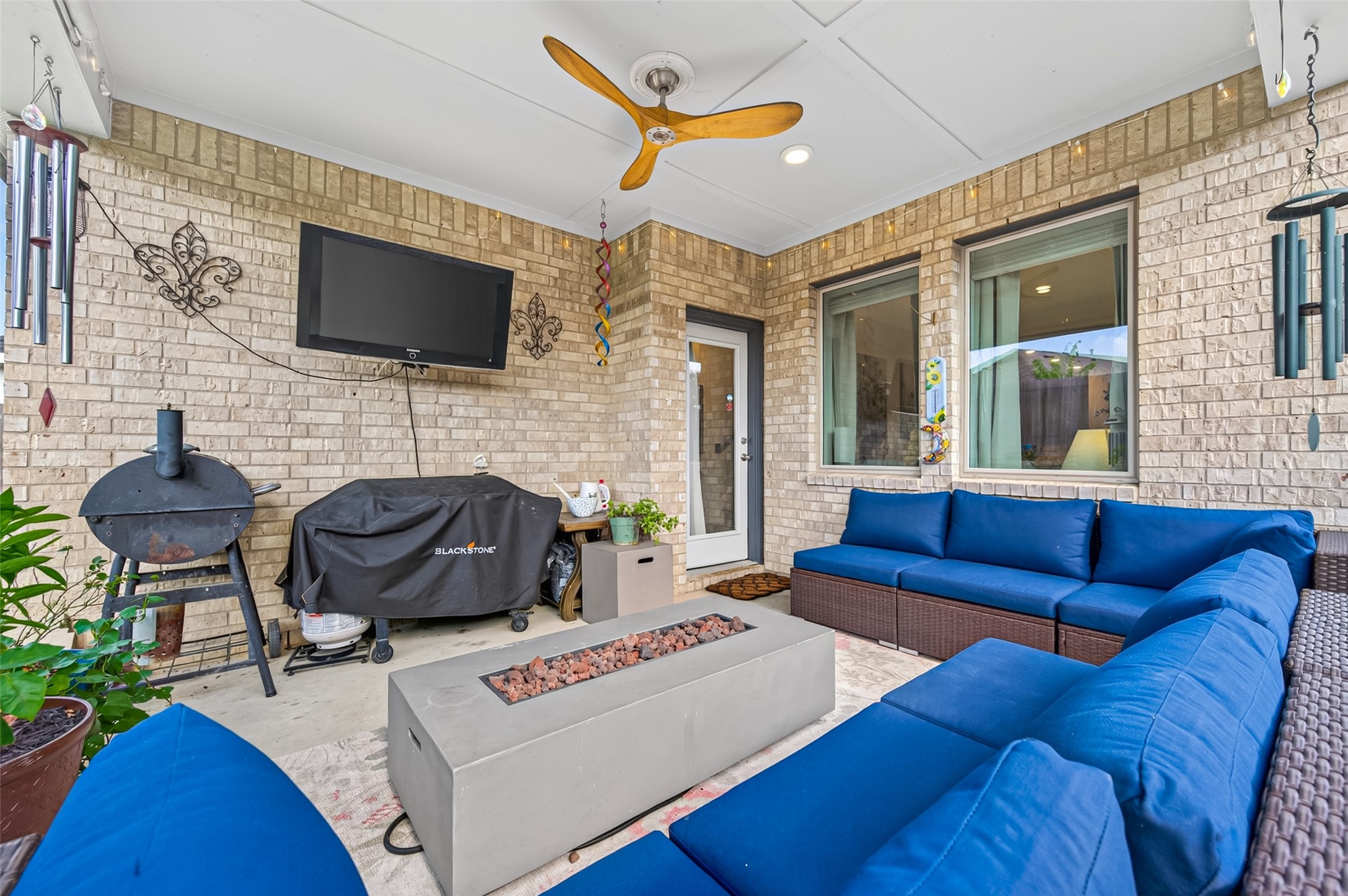 Custom outdoor patio allows extended living space year round