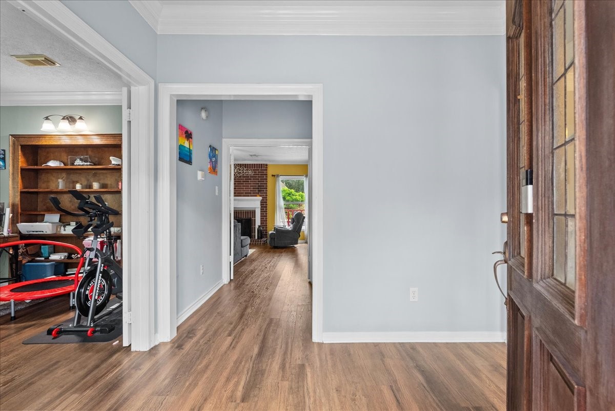 Formal entryway with office to the right and dining room to the left.