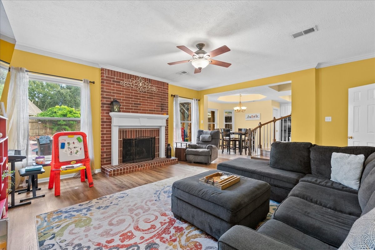 All brick fireplace completes the space, just in time for the holidays!