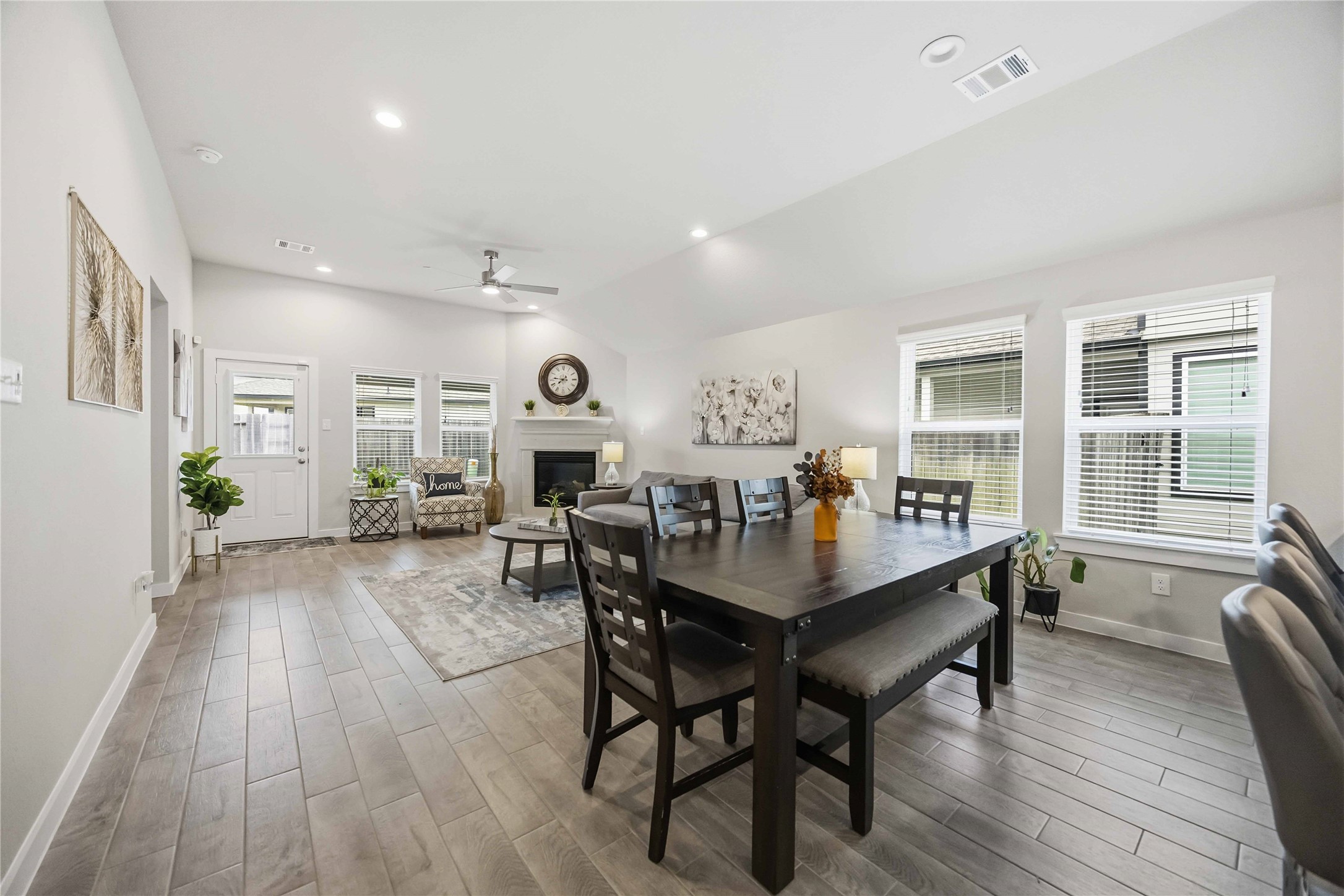 Stay connected to every moment with an open-concept design that seamlessly flows from the kitchen into the dining and living areas.