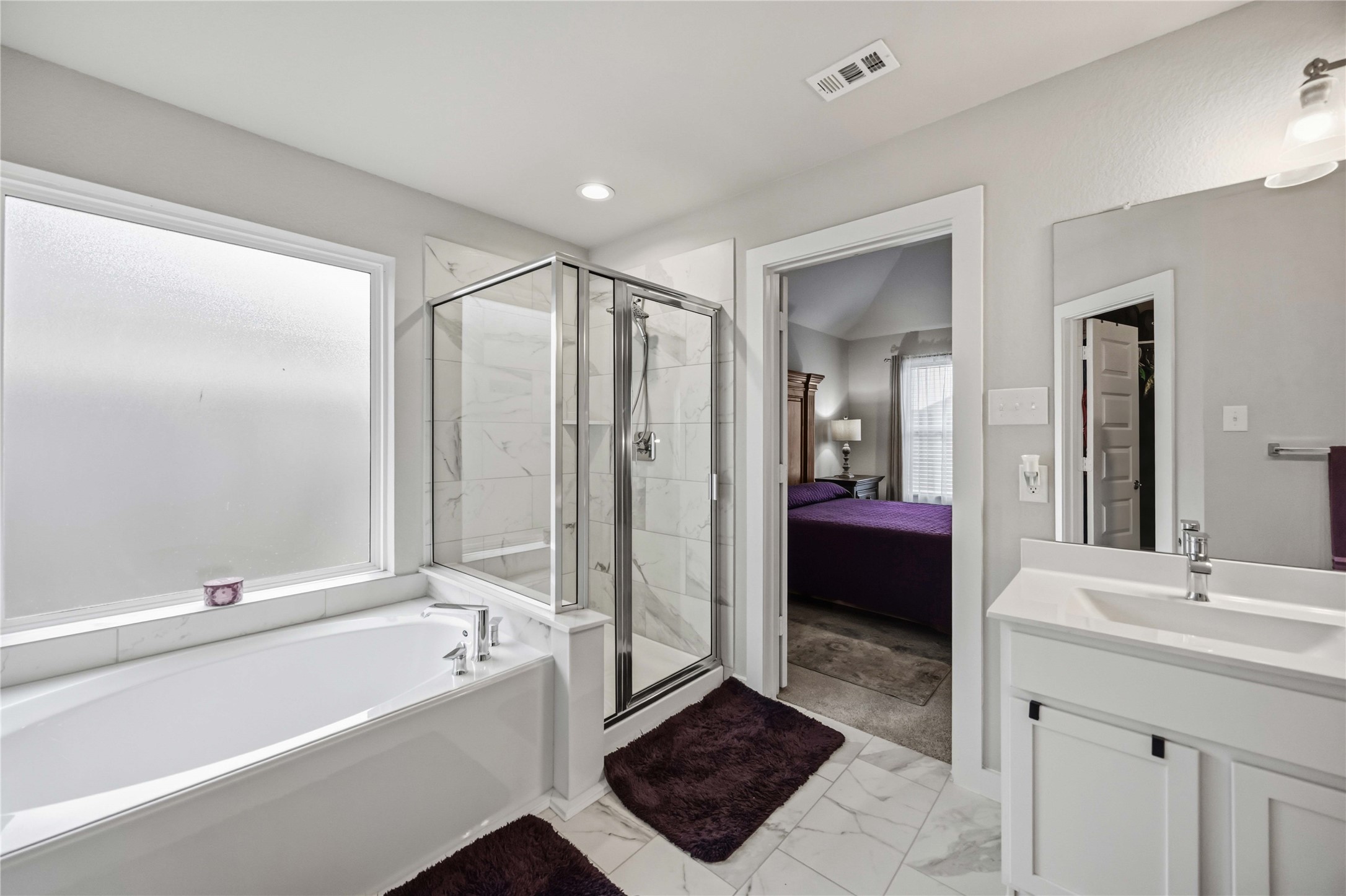 Start and end your day in comfort with double sinks, a separate shower, and a spacious bathtub