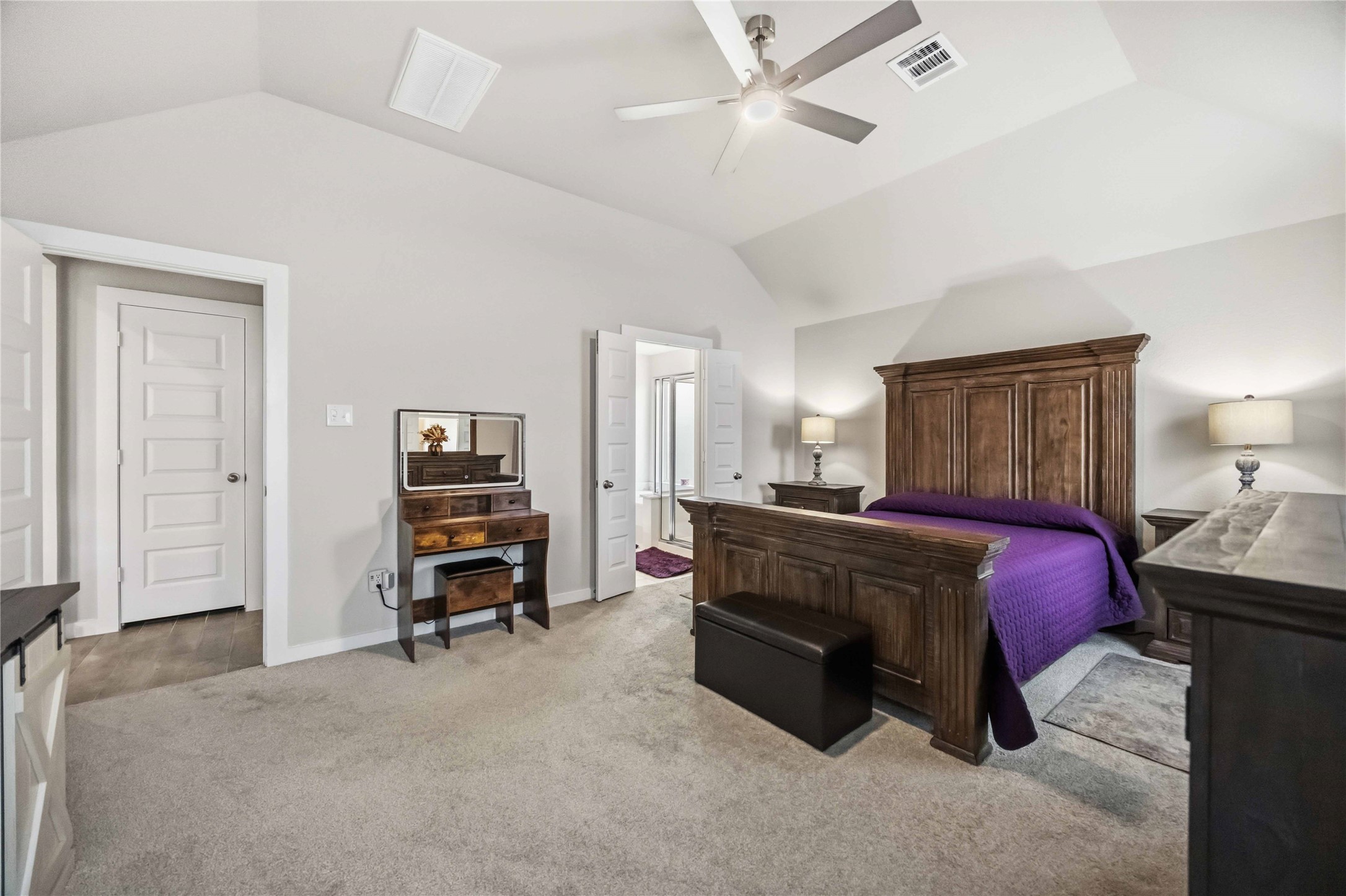 Another view of the spacious primary bedroom, your perfect retreat at the end of the day!