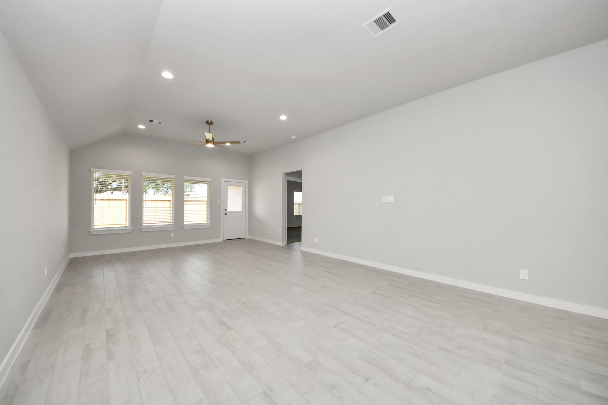 Take another glimpse into the heart of the home with this additional view of the family rooma sprawling space ready to accommodate all your gatherings. Sample photo of completed home with similar floor plan. Actual colors and selections may vary.