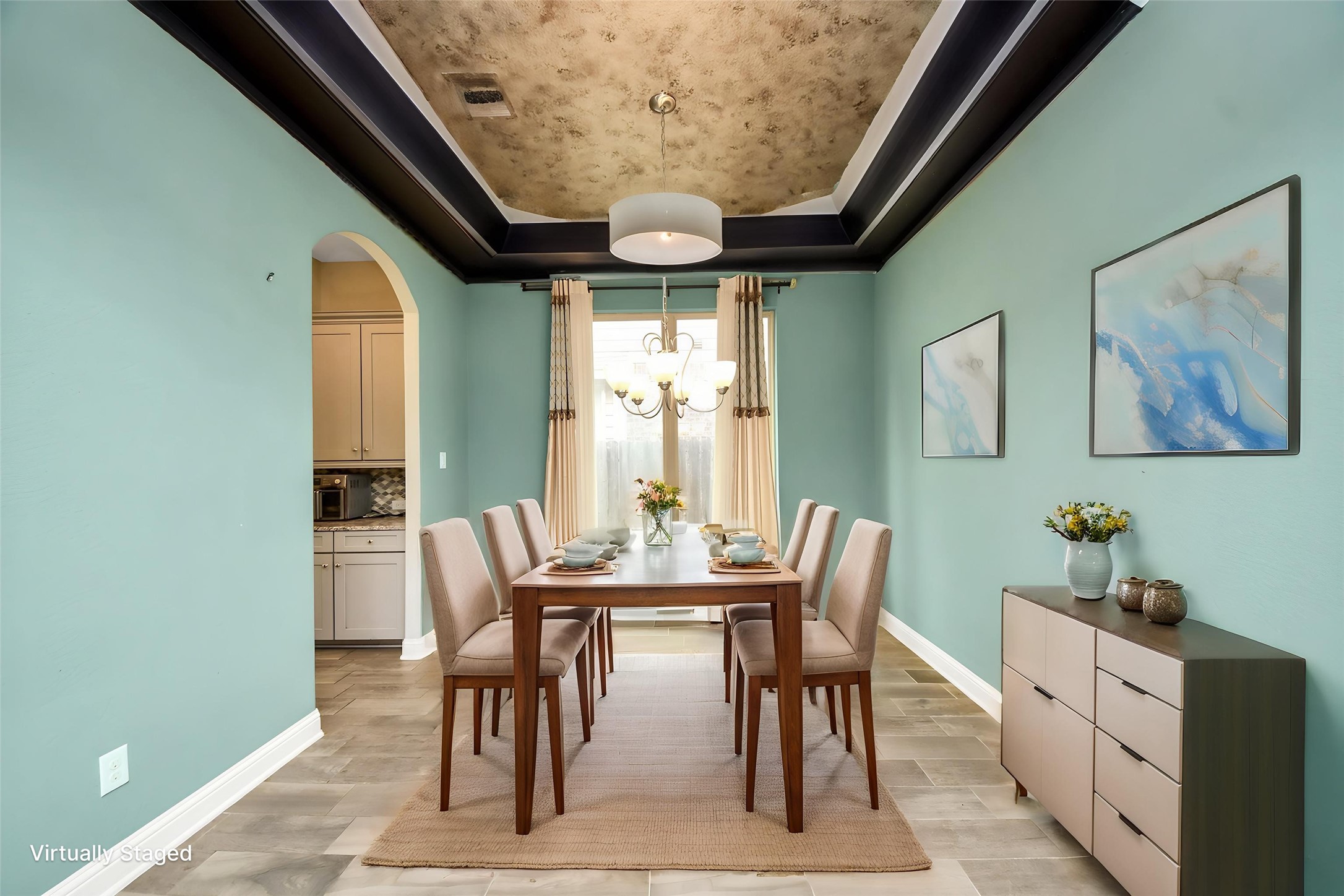 Virtually Staged Formal dining room with dramatic tray ceiling, architectural detailing, and virtual staging for entertaining. Virtually Staged Formal dining room with dramatic tray ceiling, architectural detailing, and virtual staging for entertaining.