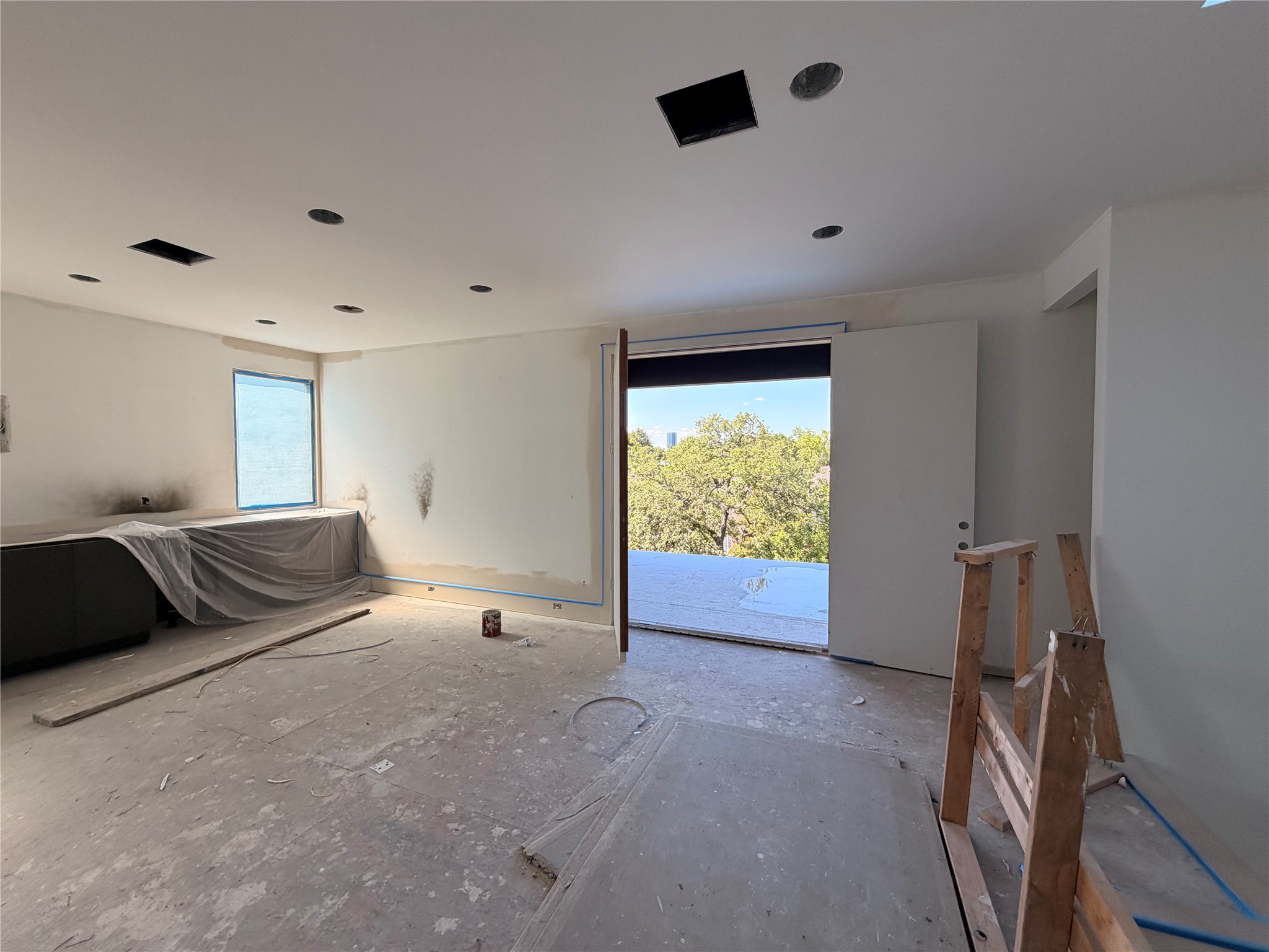Gameroom looking out to third story terrace