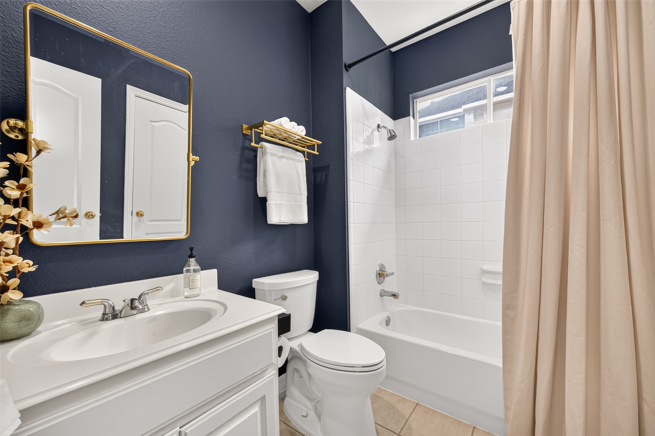 First floor bath with abundant natural light.
