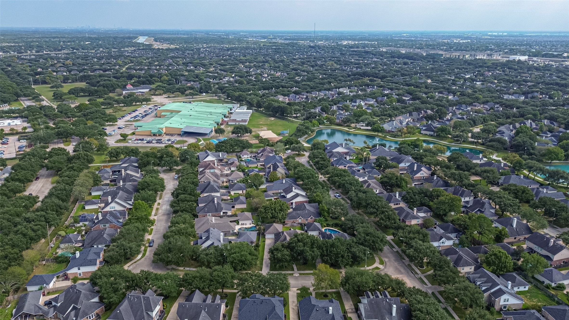 Nestled in a lush, green landscape, this vibrant neighborhood boasts beautifully arranged homes, a scenic pond, and proximity to a well-maintained community center, offering a perfect blend of tranquility and convenience.