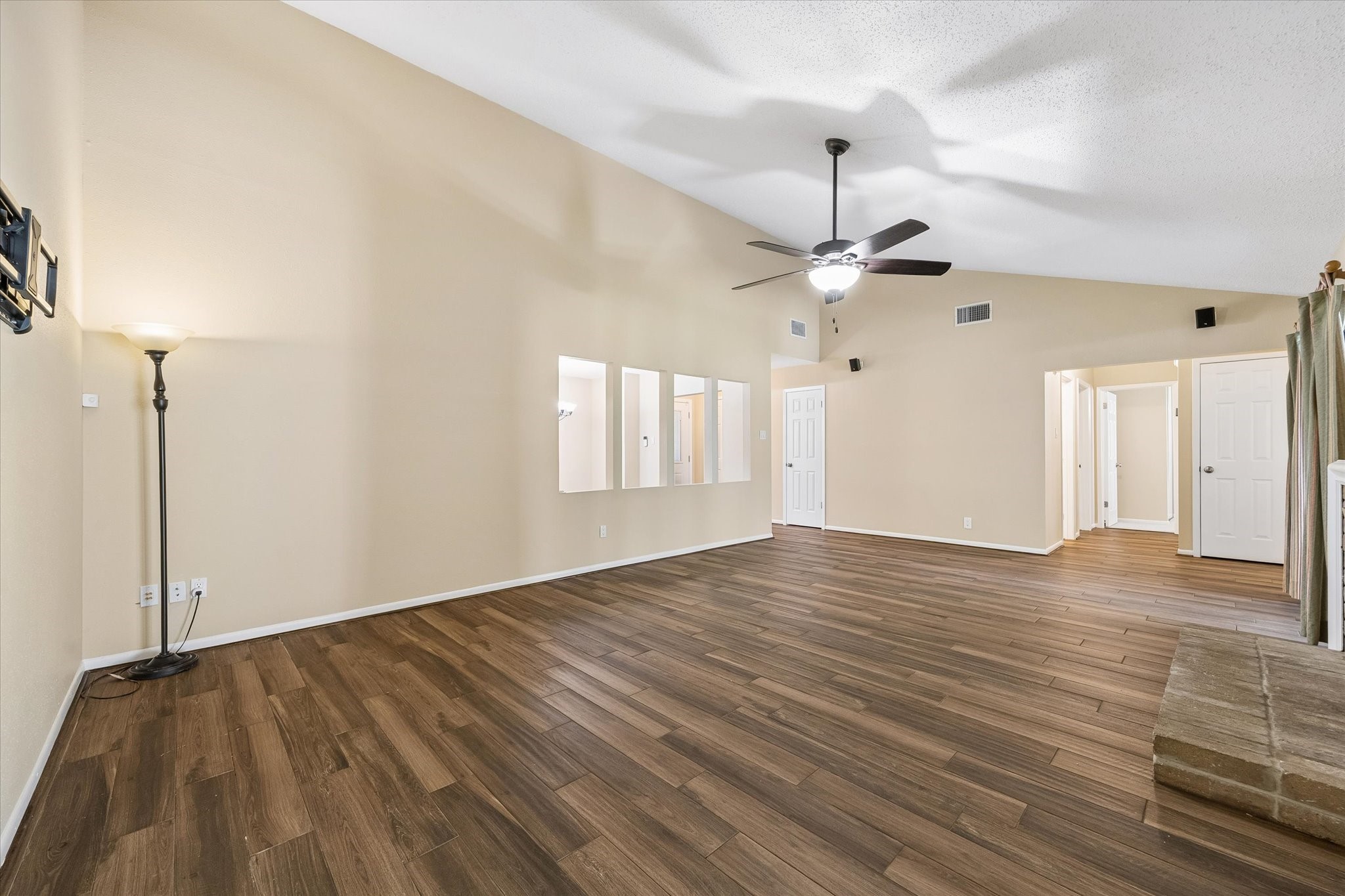 Room to relax and gather! This open living area offers plenty of possibilities for creating your own comfortable retreat.