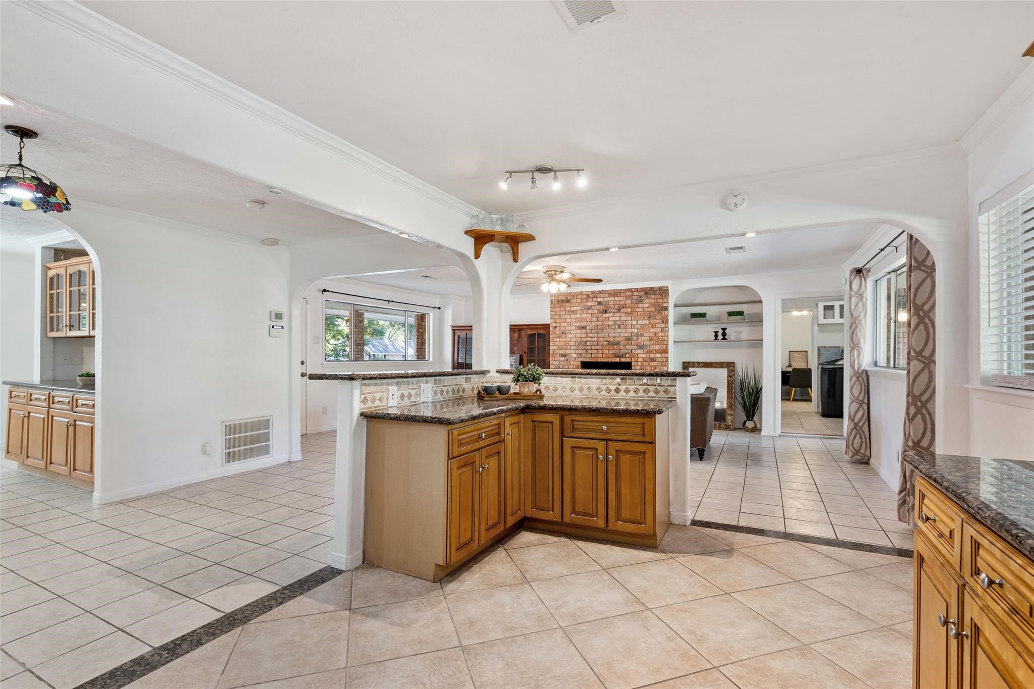 Small bar area is an entertaining feature and compliments the open concept design.*Home was previously furnished. There is currently no furniture in the home.