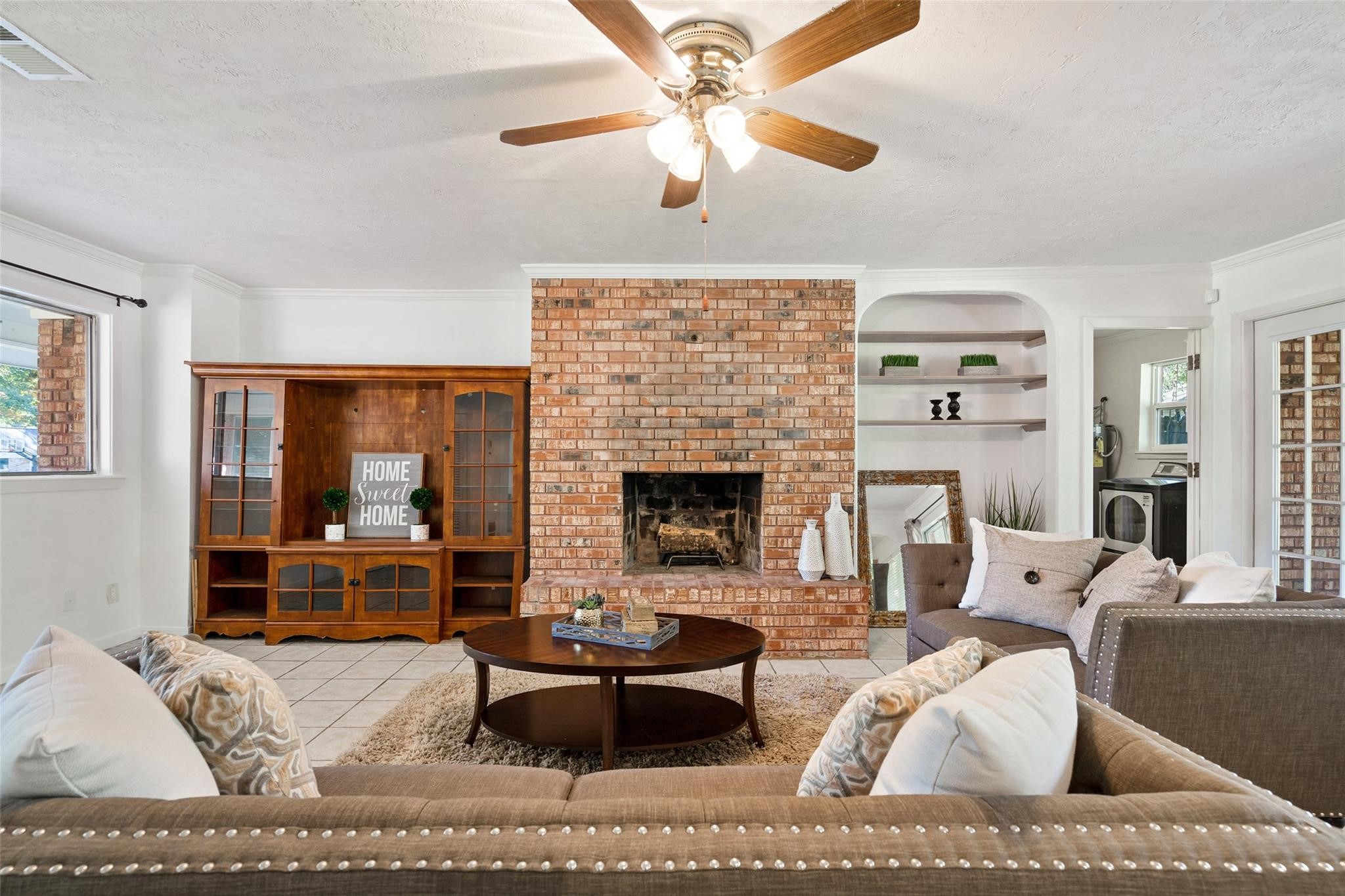 Imagine cozy nights gathered around the fireplace with multiple built in shelves and fresh neutral paint.*Home was previously furnished. There is currently no furniture in the home.